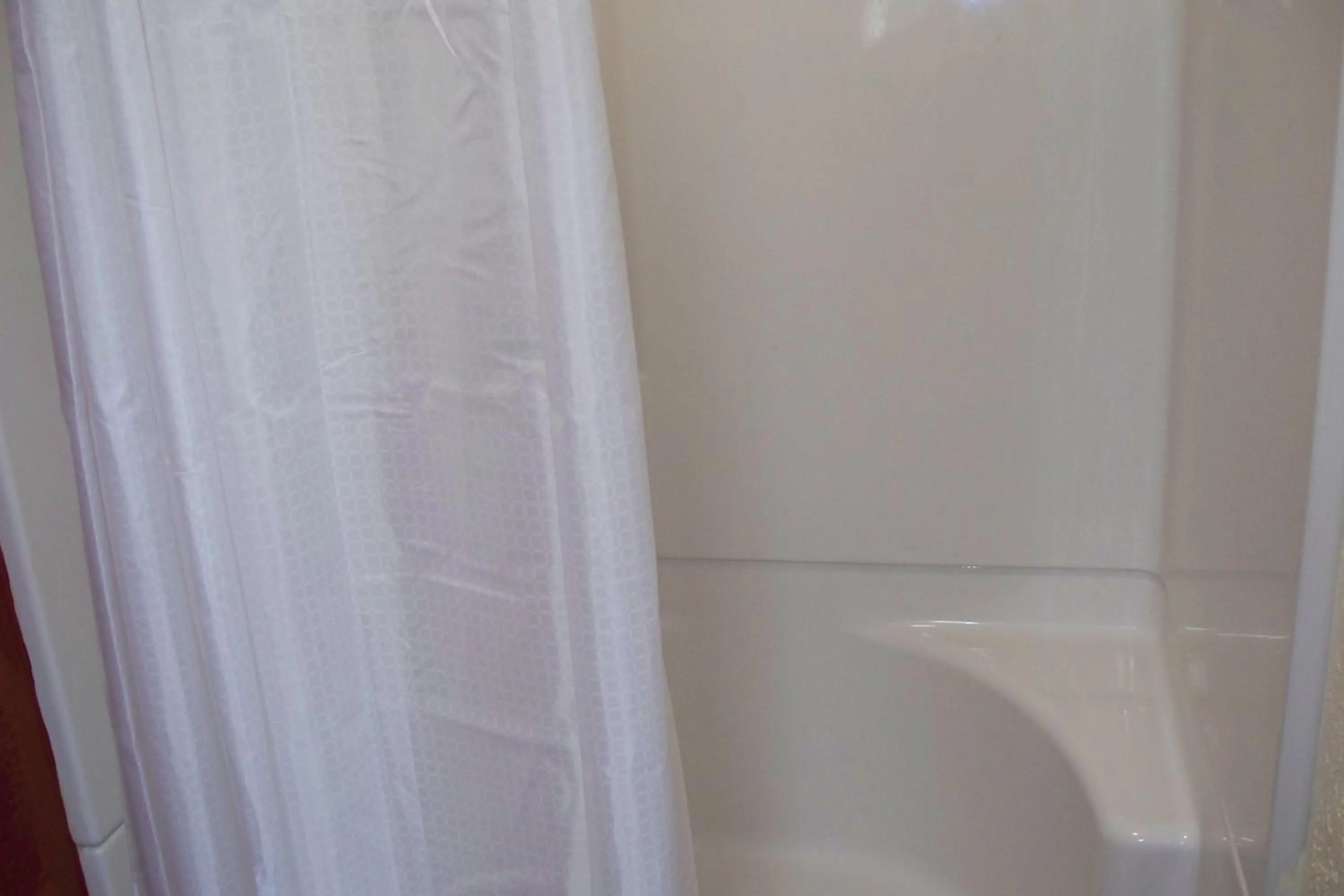 Toilet in Budget Inn & Suites