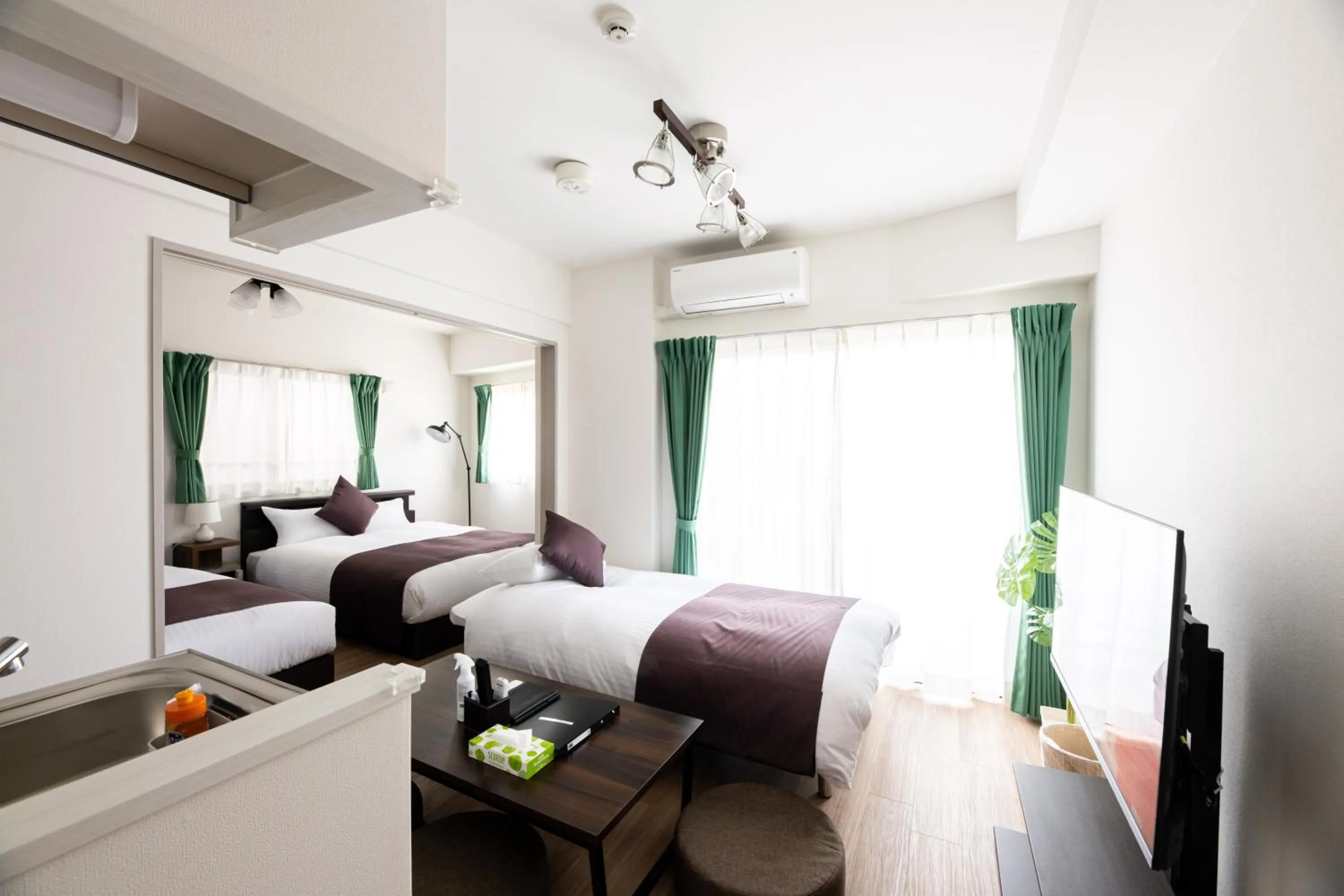 Bed in Grand Inn Canalside