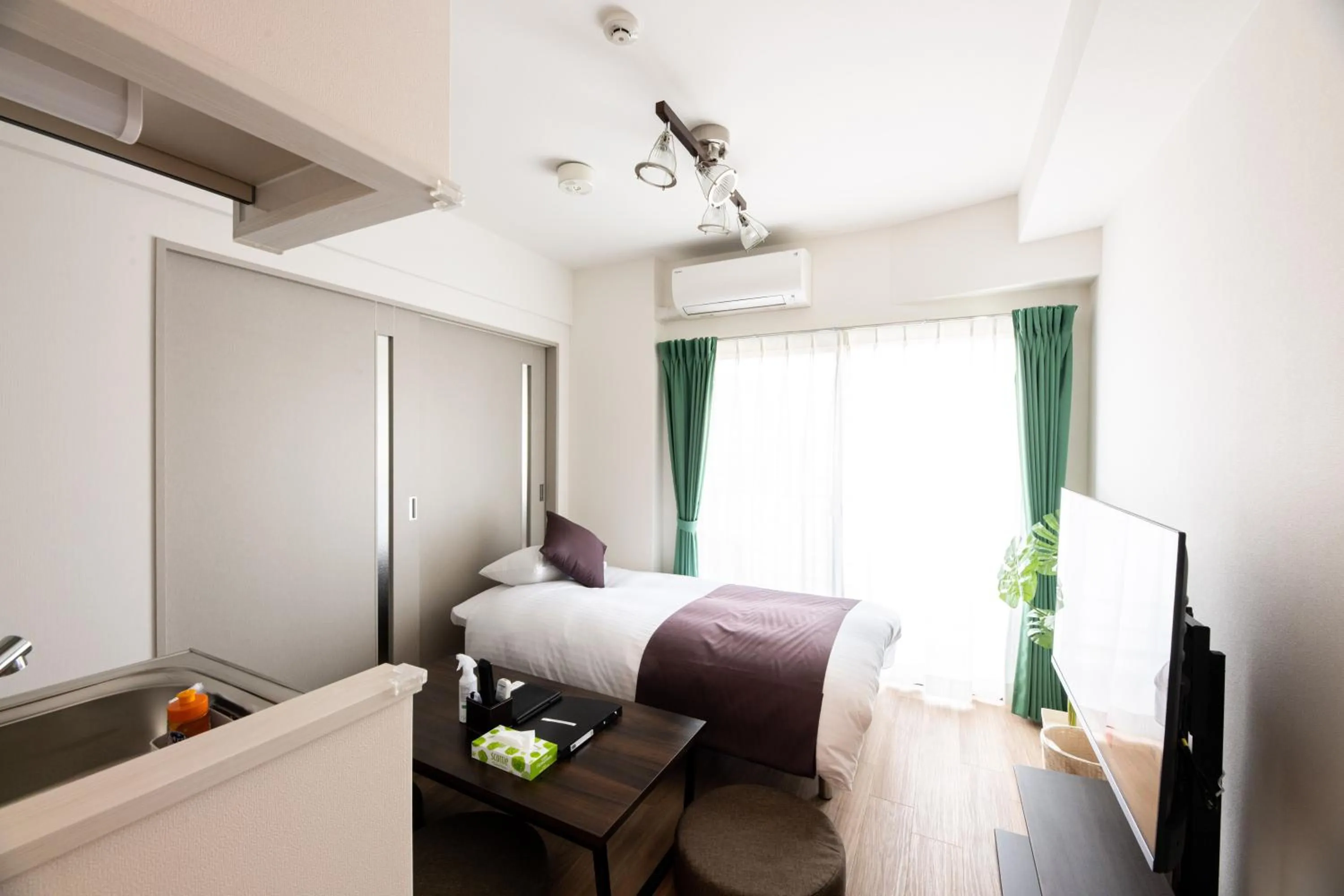 Bed in Grand Inn Canalside