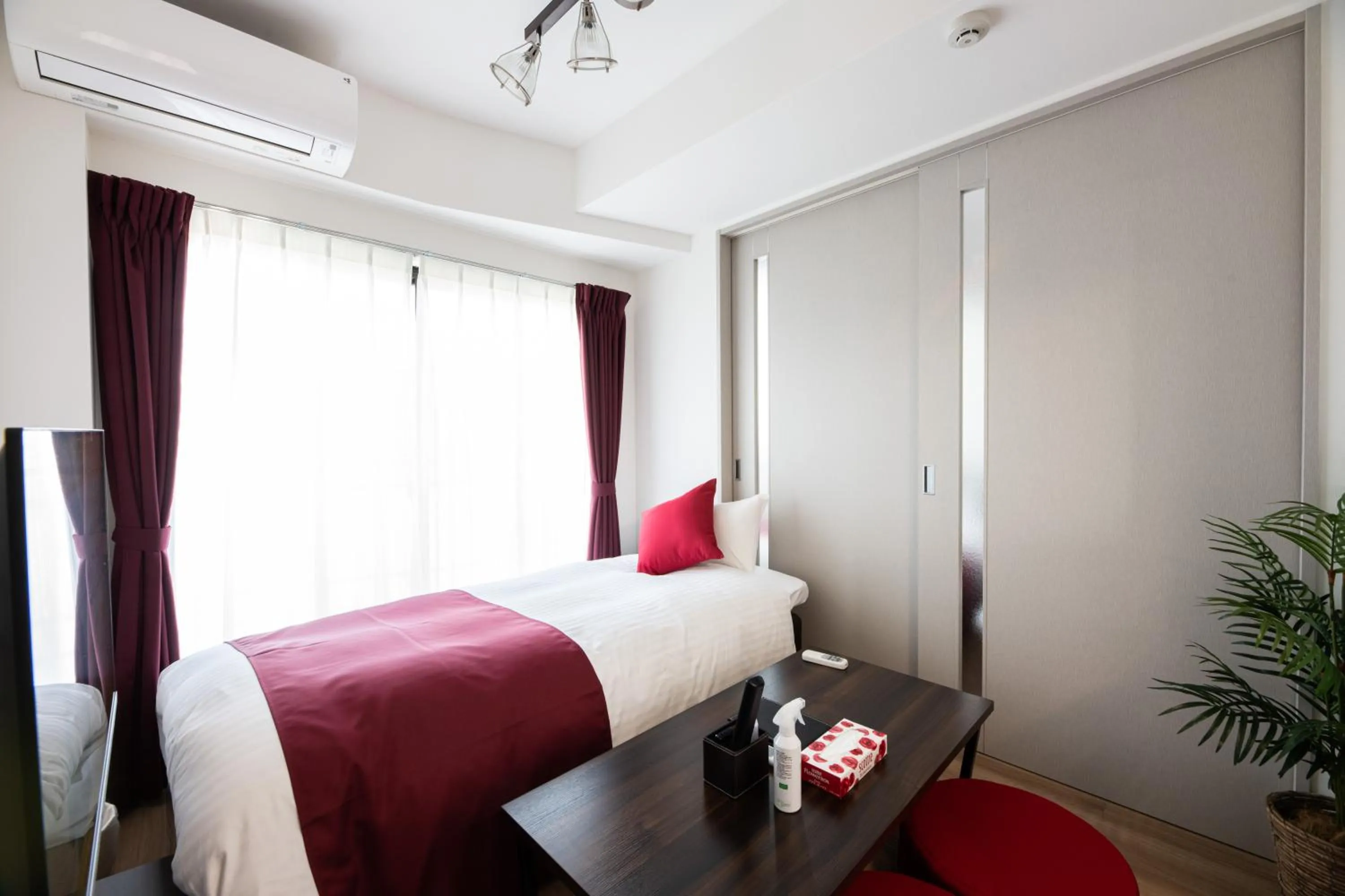 Bed in Grand Inn Canalside