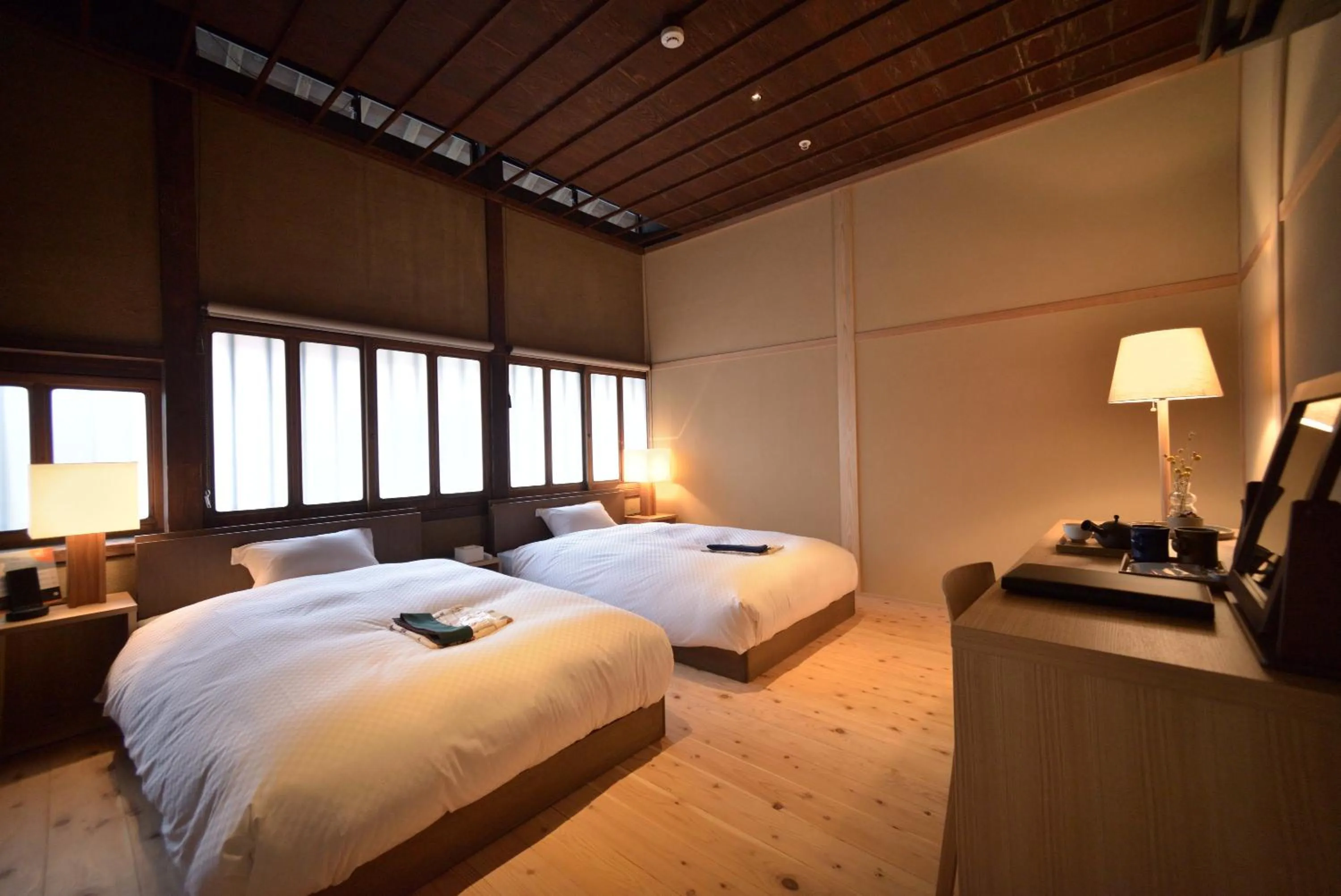 Bedroom, Bed in NIPPONIA HOTEL Yamefukushima Merchant Town