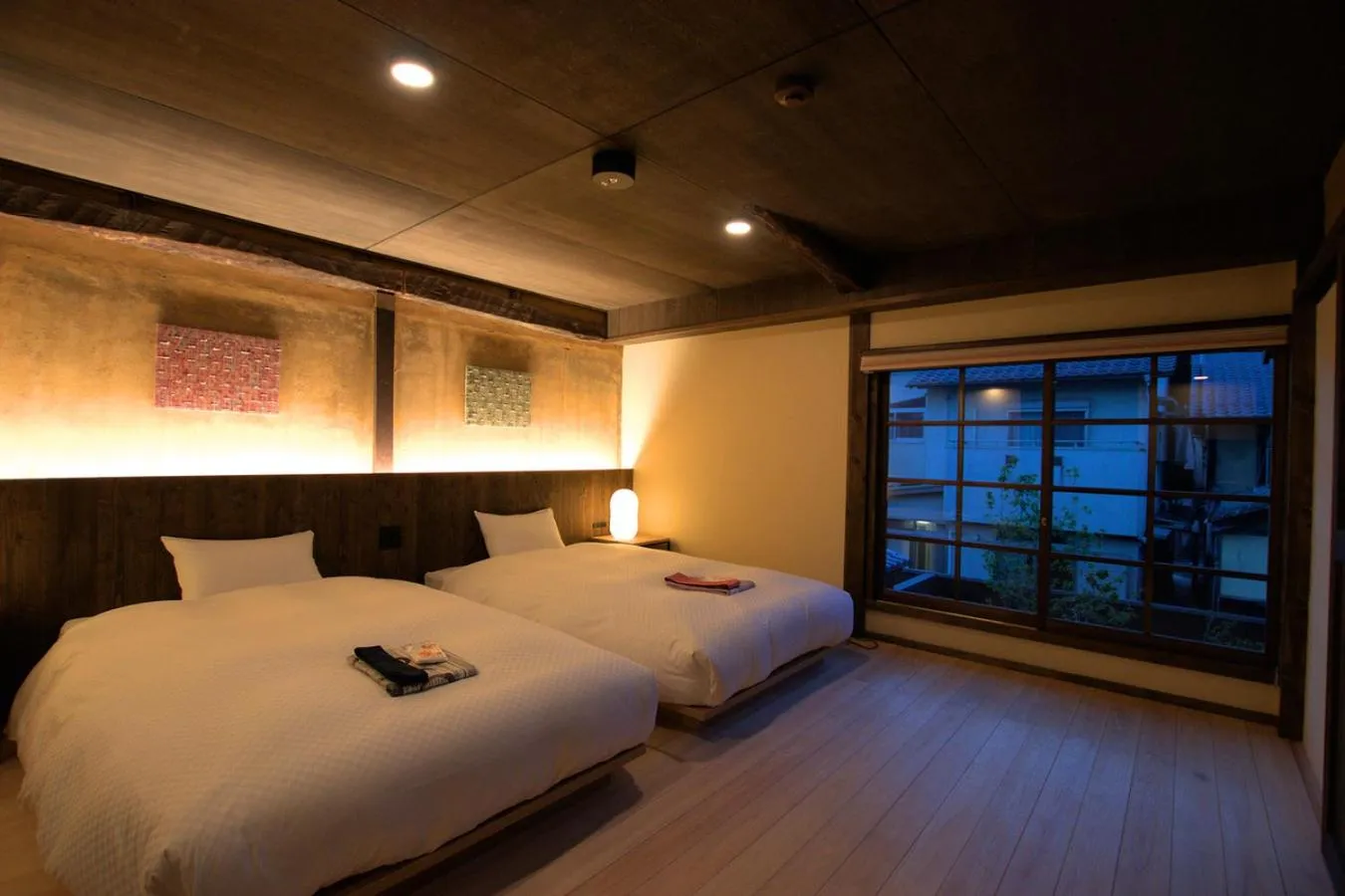 Bed in NIPPONIA HOTEL Ozu Castle Town