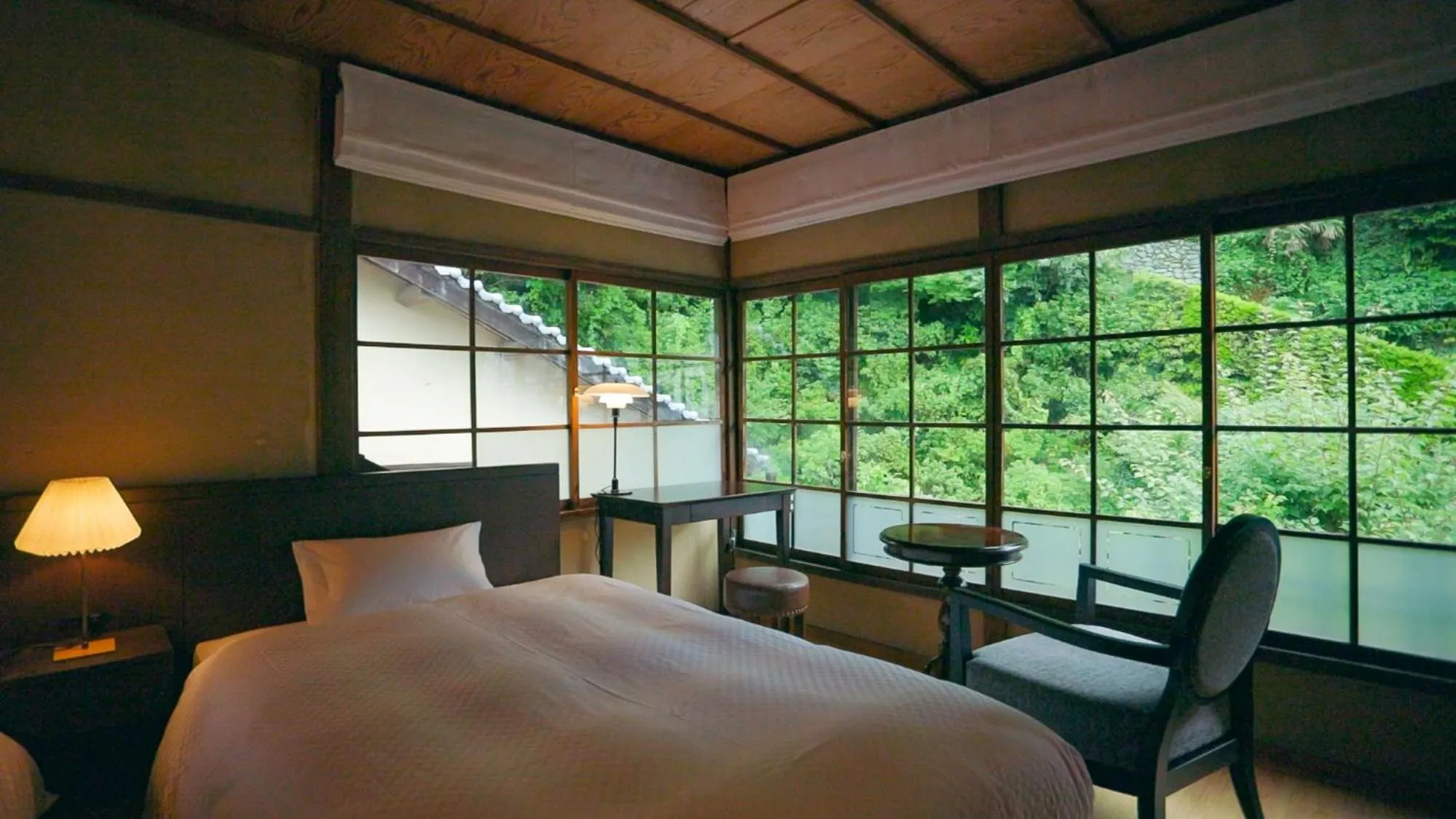 Bed in NIPPONIA HOTEL Ozu Castle Town