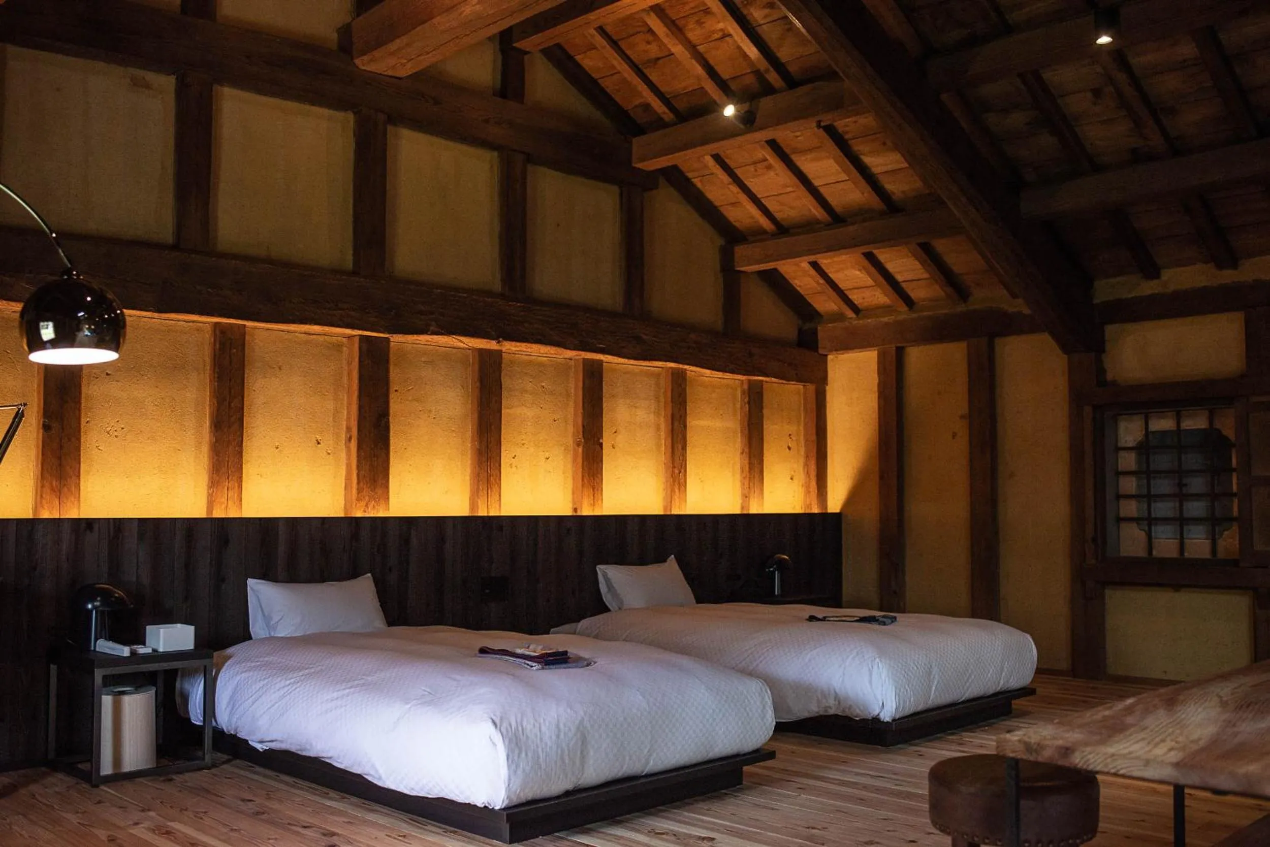 Bed in NIPPONIA HOTEL Ozu Castle Town