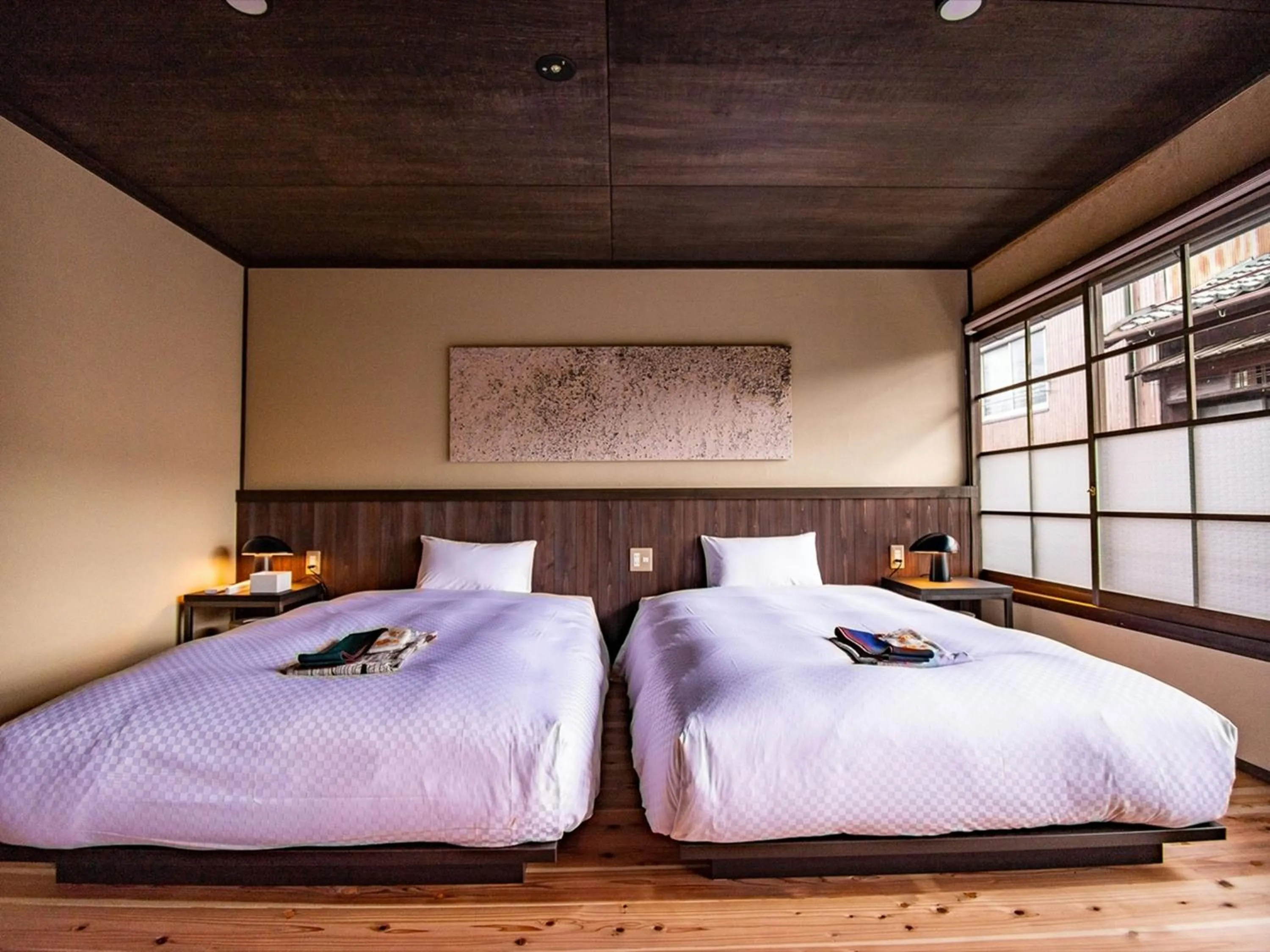 Bed in NIPPONIA HOTEL Ozu Castle Town