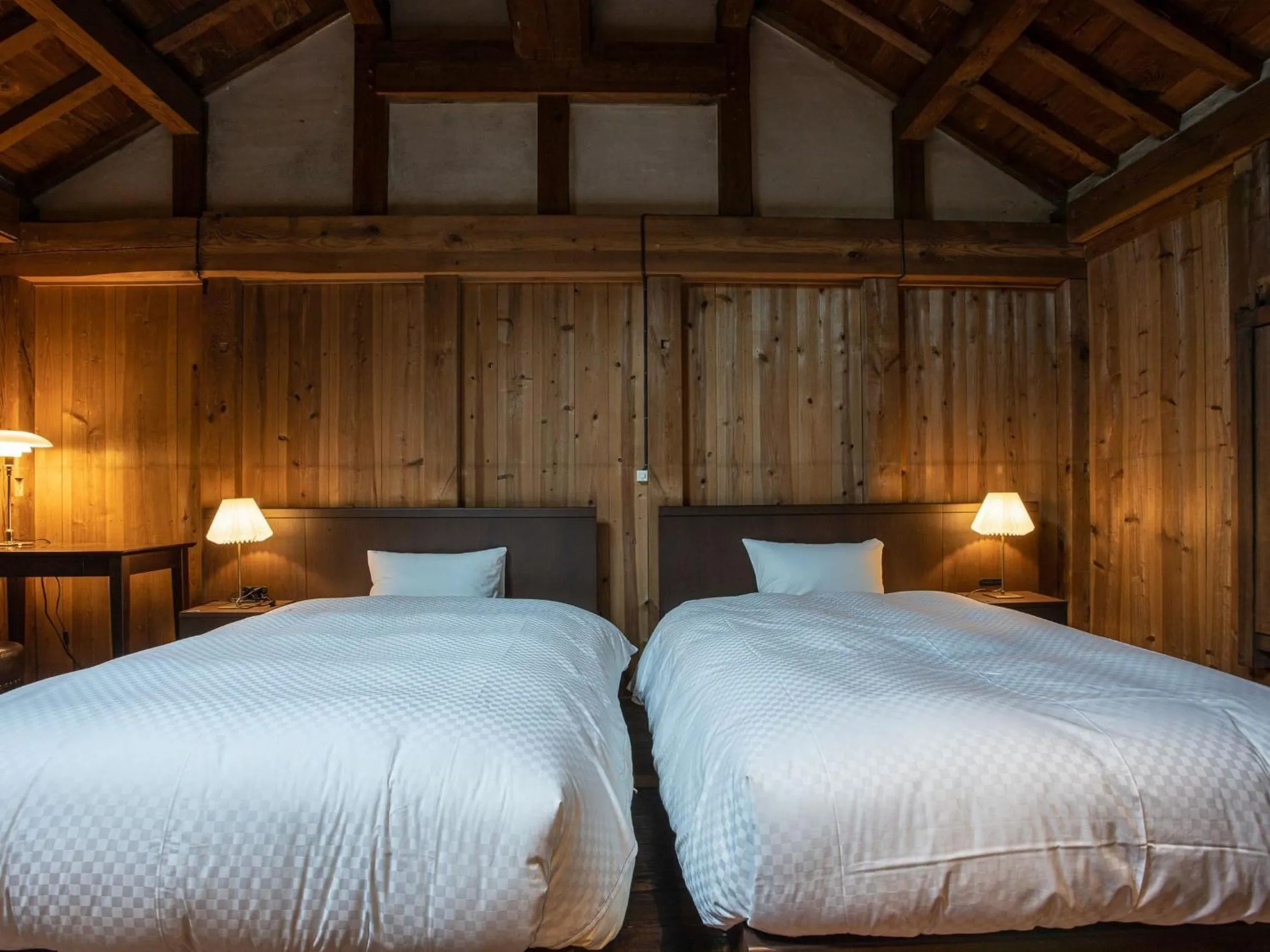 Bed in NIPPONIA HOTEL Ozu Castle Town