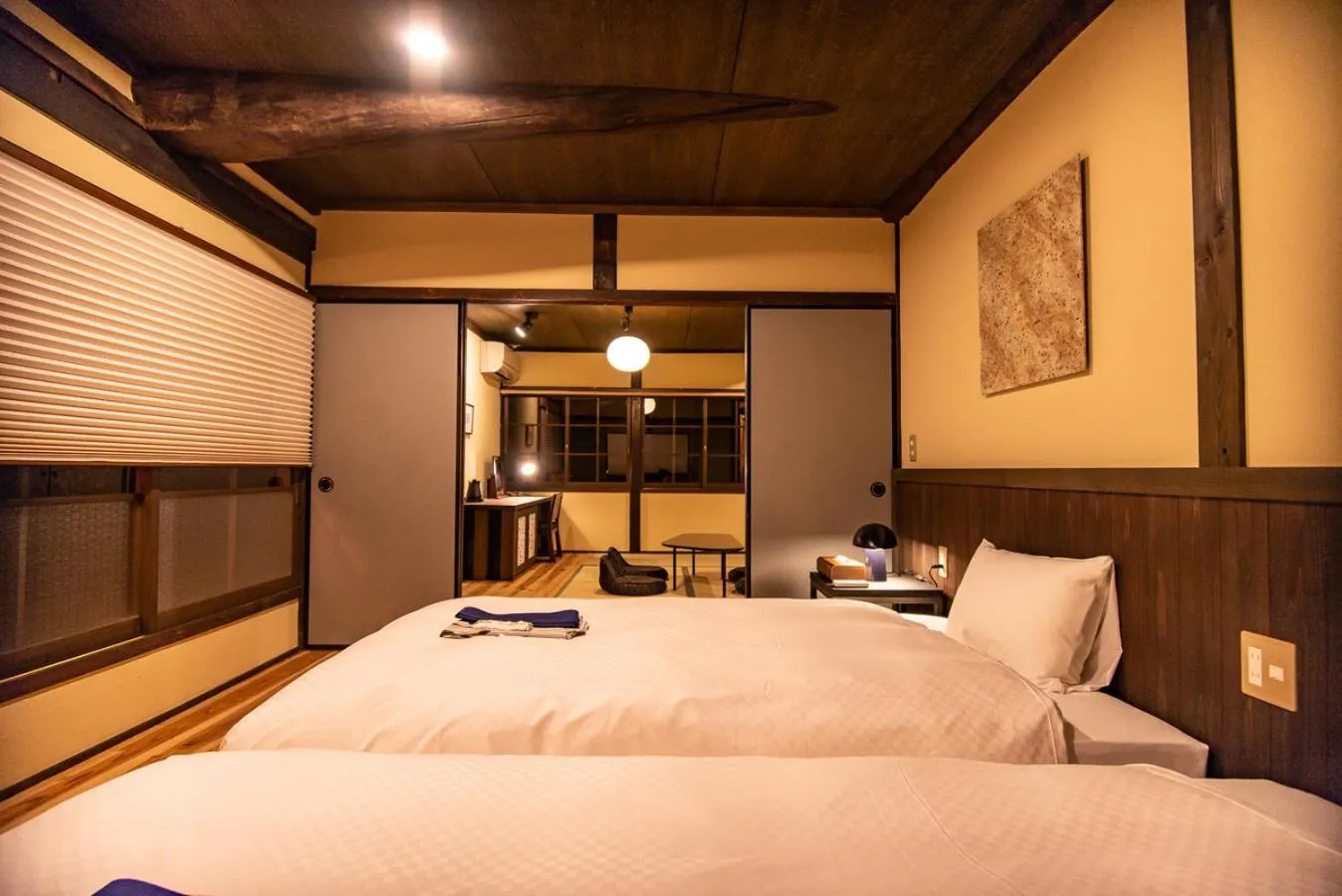 Bed in NIPPONIA HOTEL Ozu Castle Town