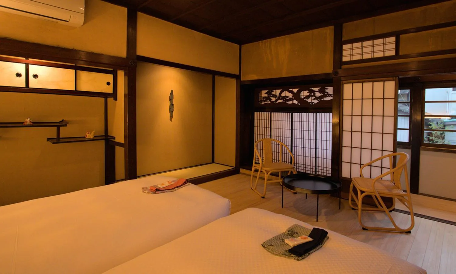 Bed in NIPPONIA HOTEL Ozu Castle Town