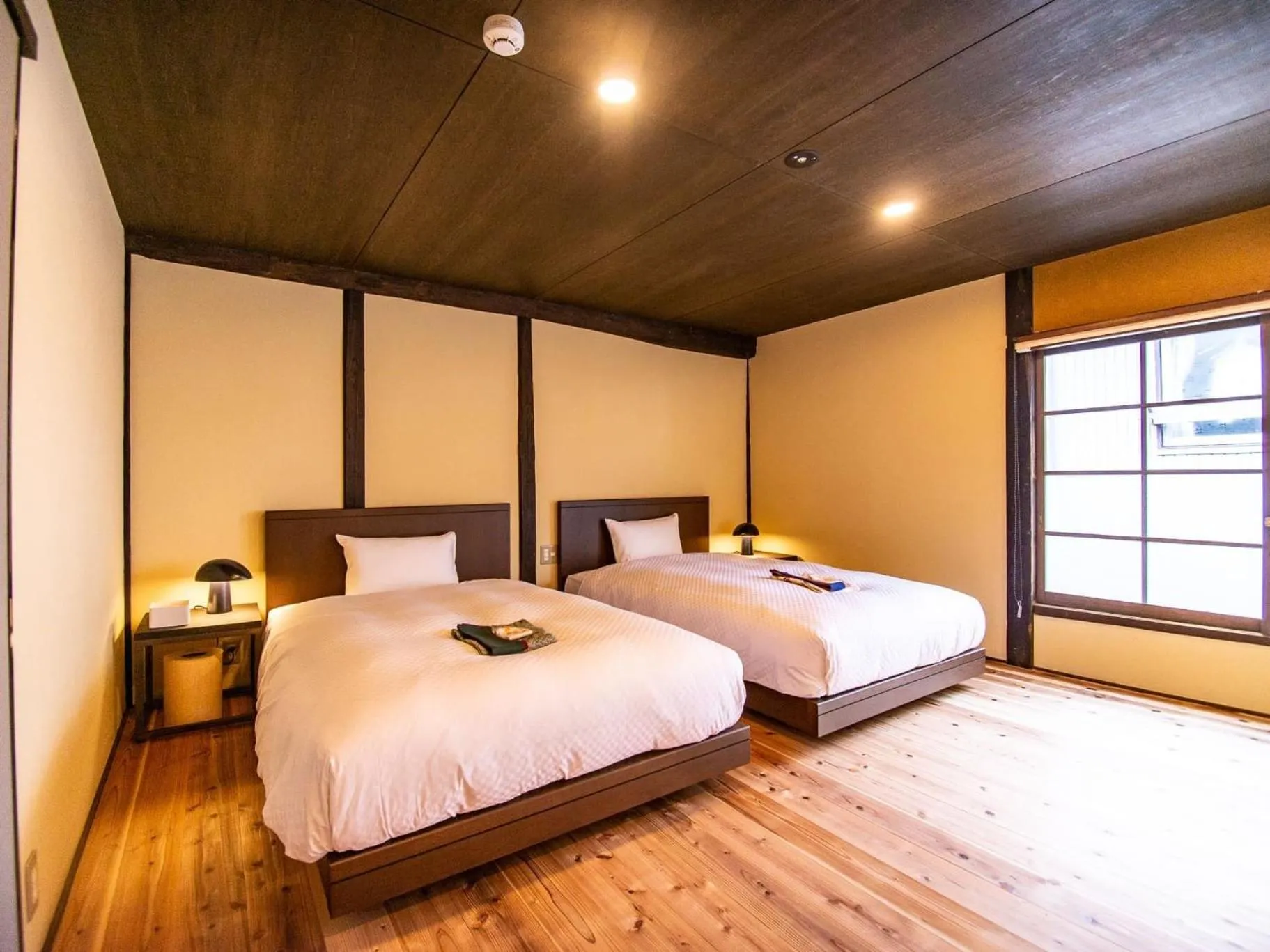 Bed in NIPPONIA HOTEL Ozu Castle Town