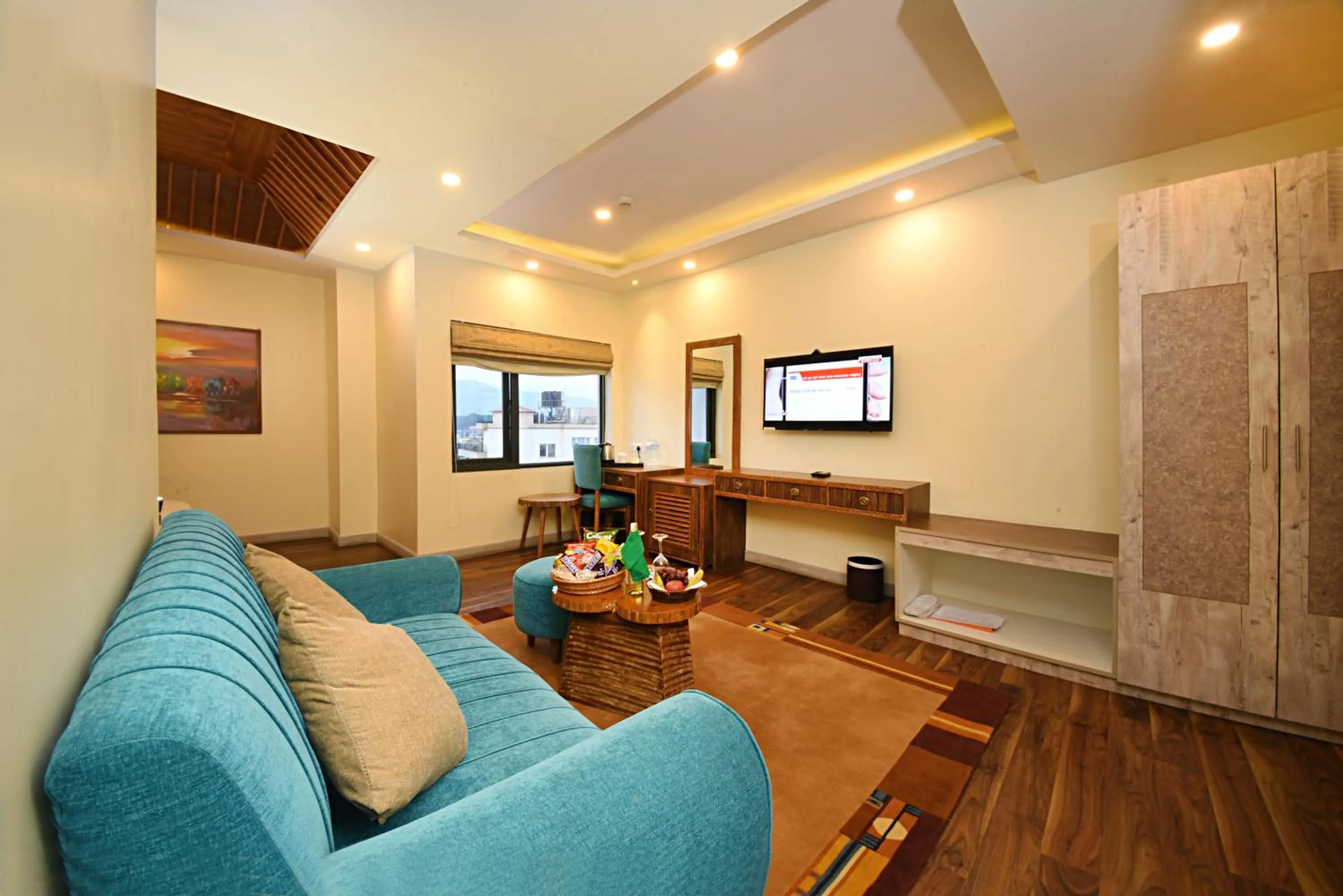 TV and multimedia in Woodapple Hotel and Spa