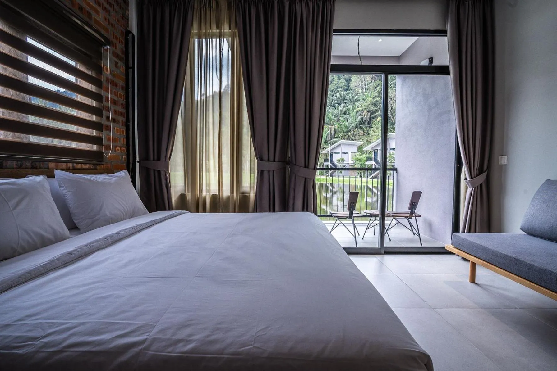 Balcony/Terrace, Bed in Sementra Hot Spring Nature Resort