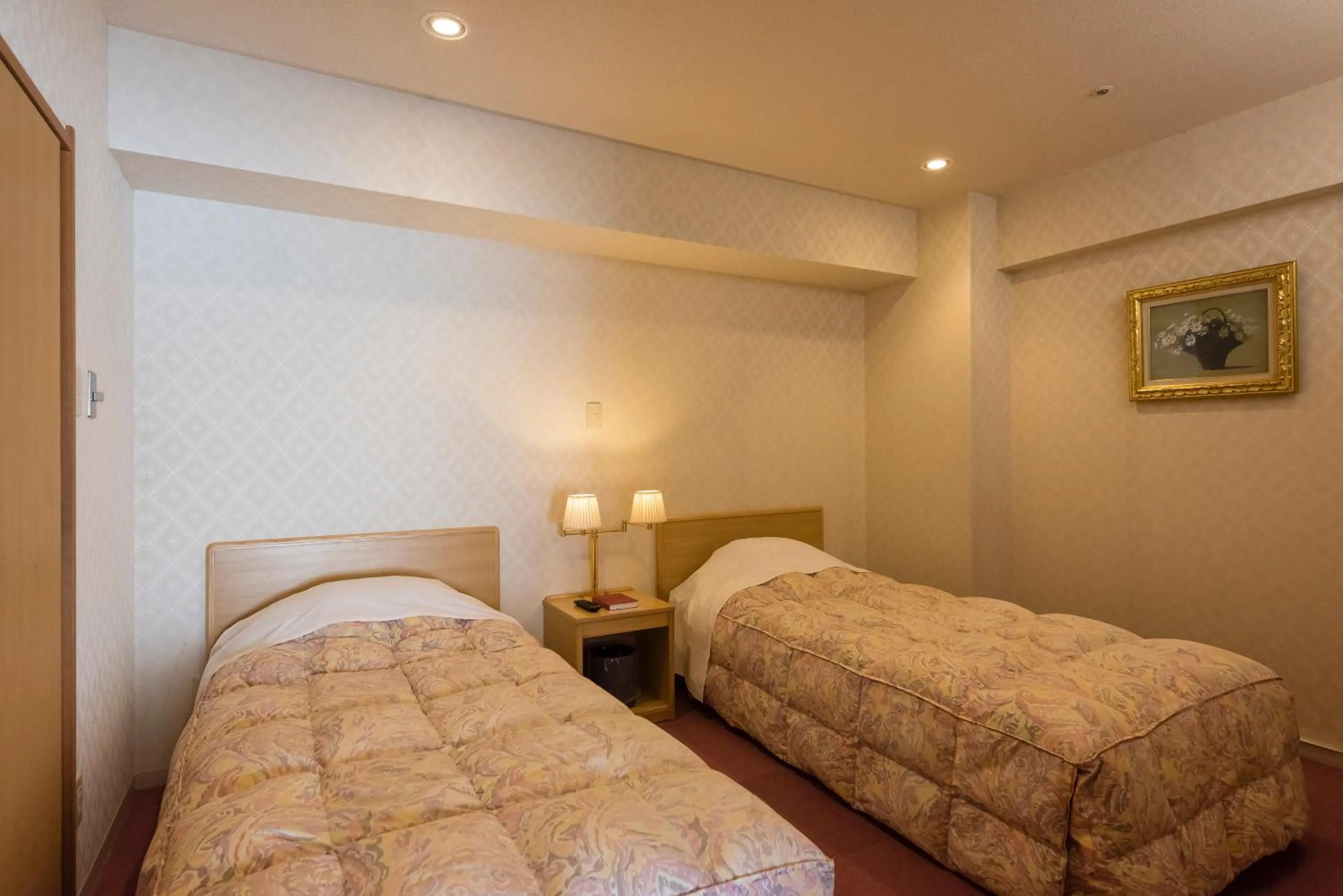 Bed in Nishiizu Crystal View Hotel