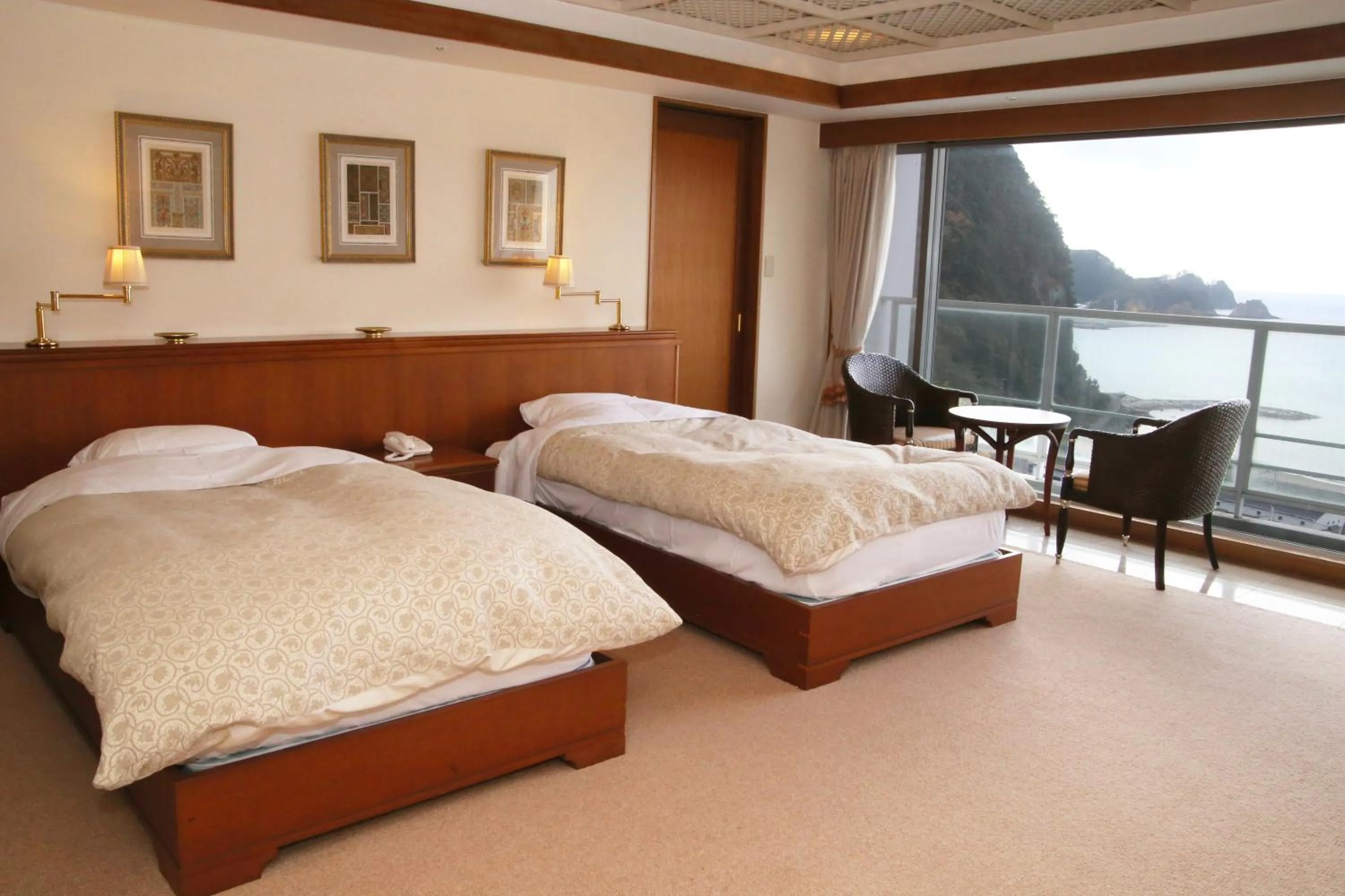 Bed in Nishiizu Crystal View Hotel