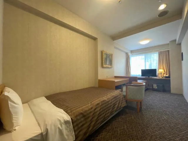 Bed in Nishiizu Crystal View Hotel