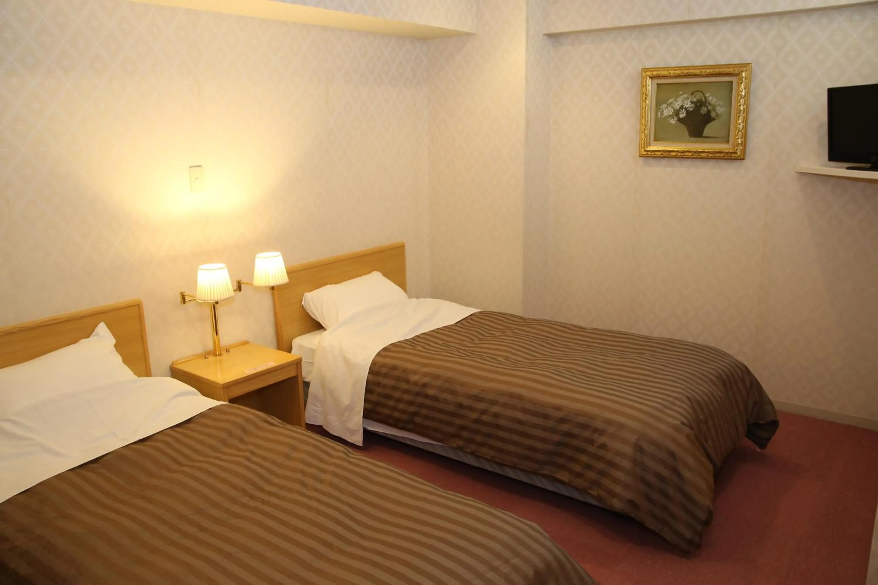 Bed in Nishiizu Crystal View Hotel