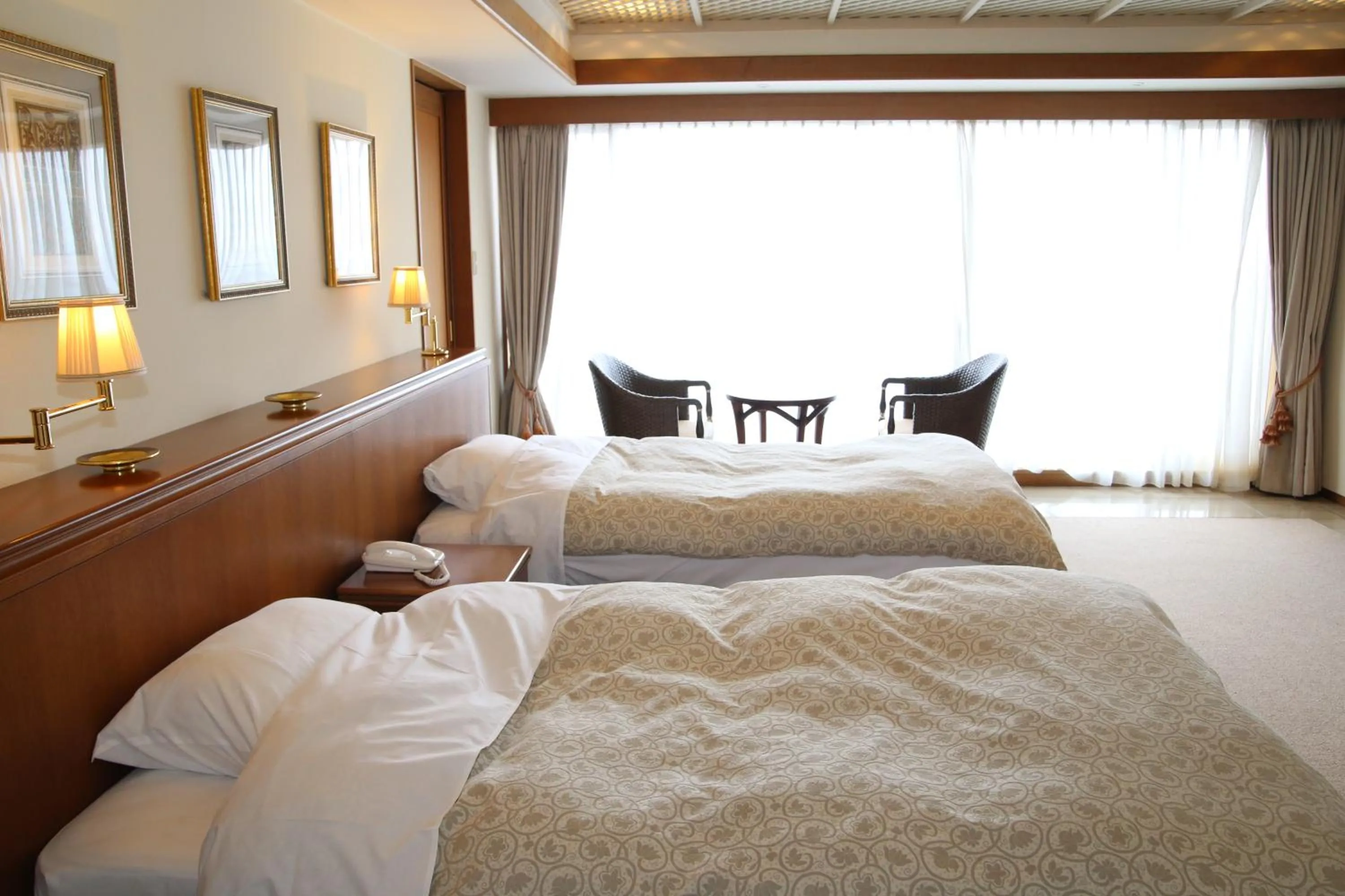 Bed in Nishiizu Crystal View Hotel