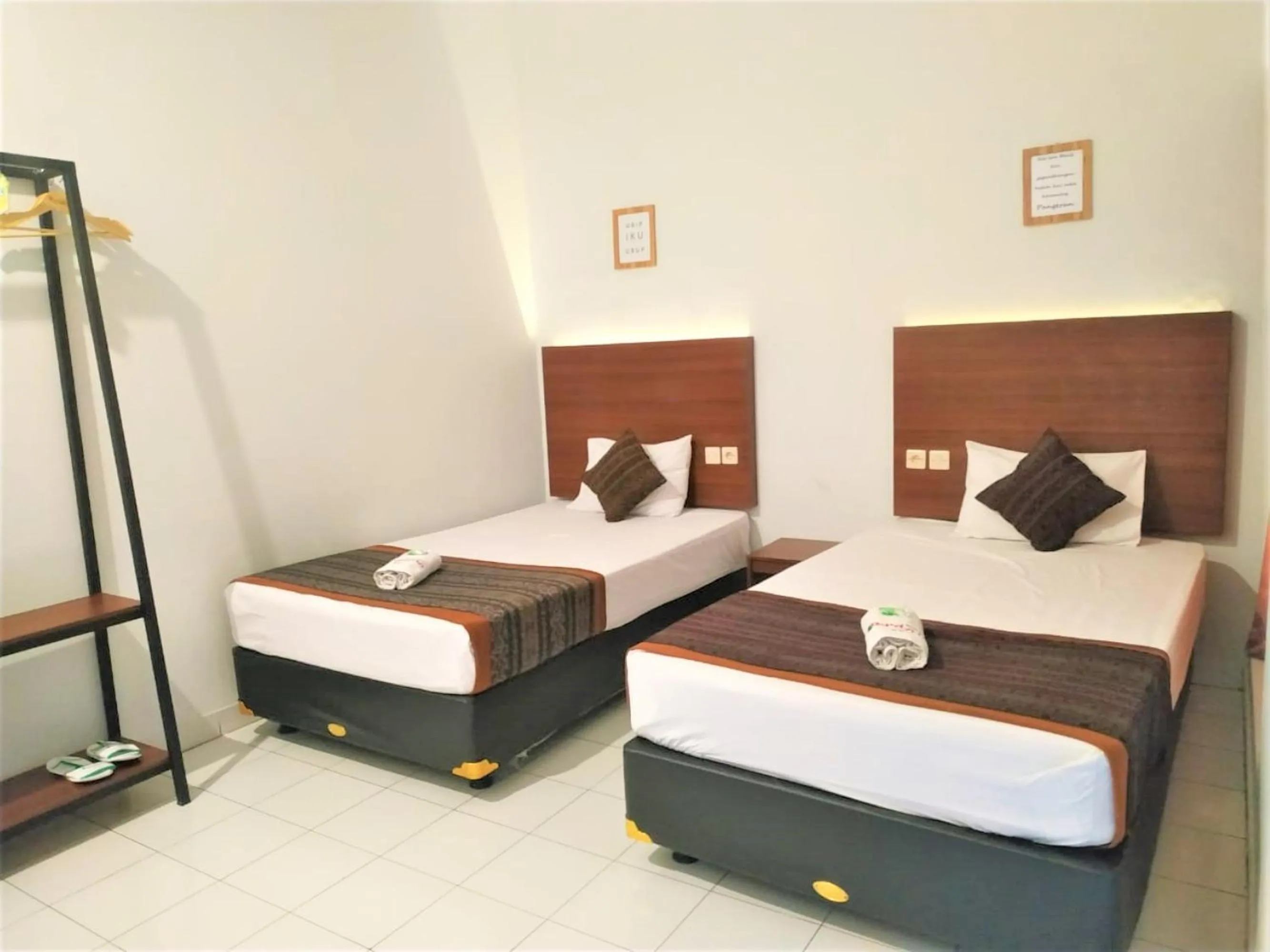 Bed in Hotel Perdana