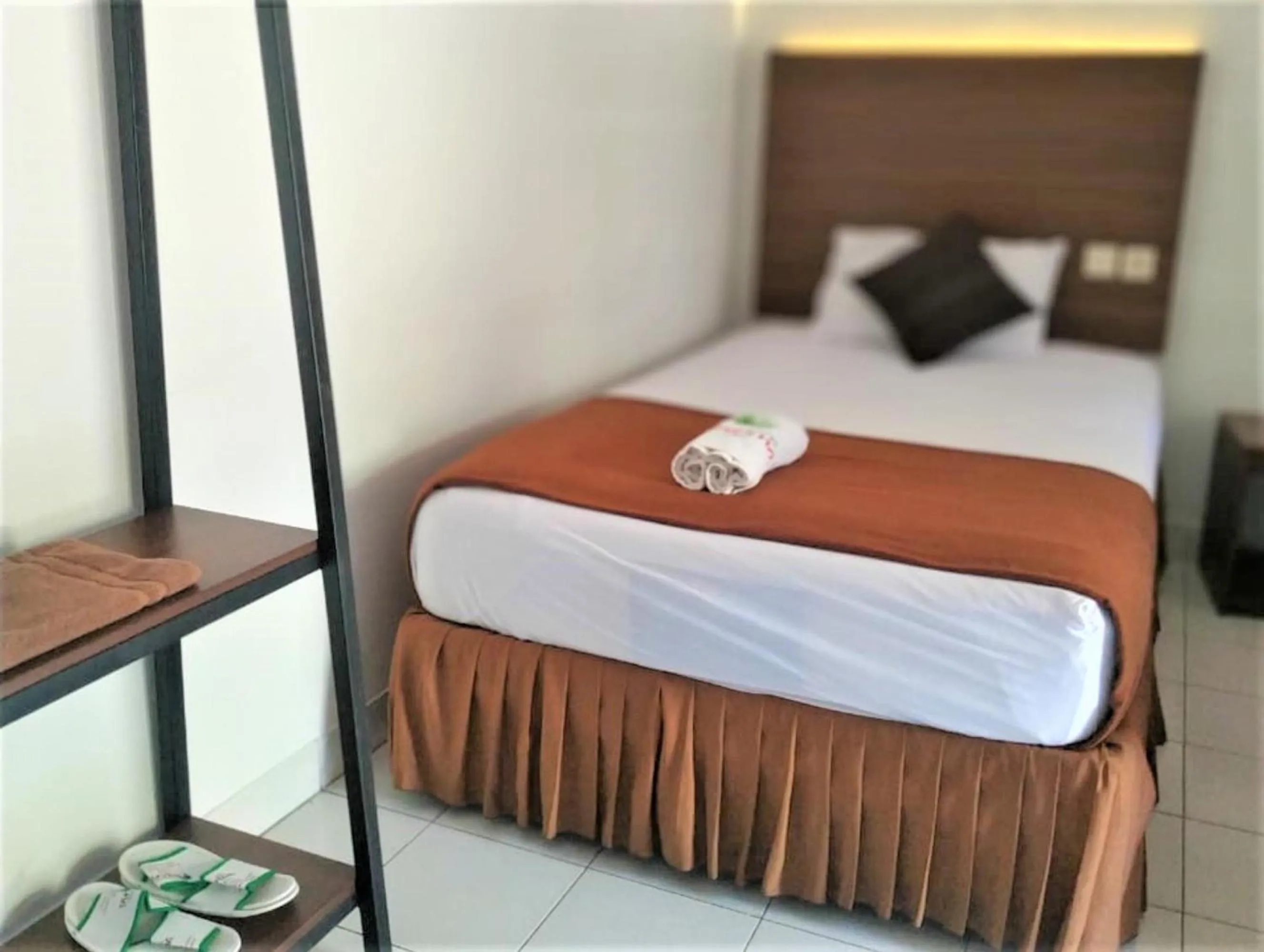 Bed in Hotel Perdana