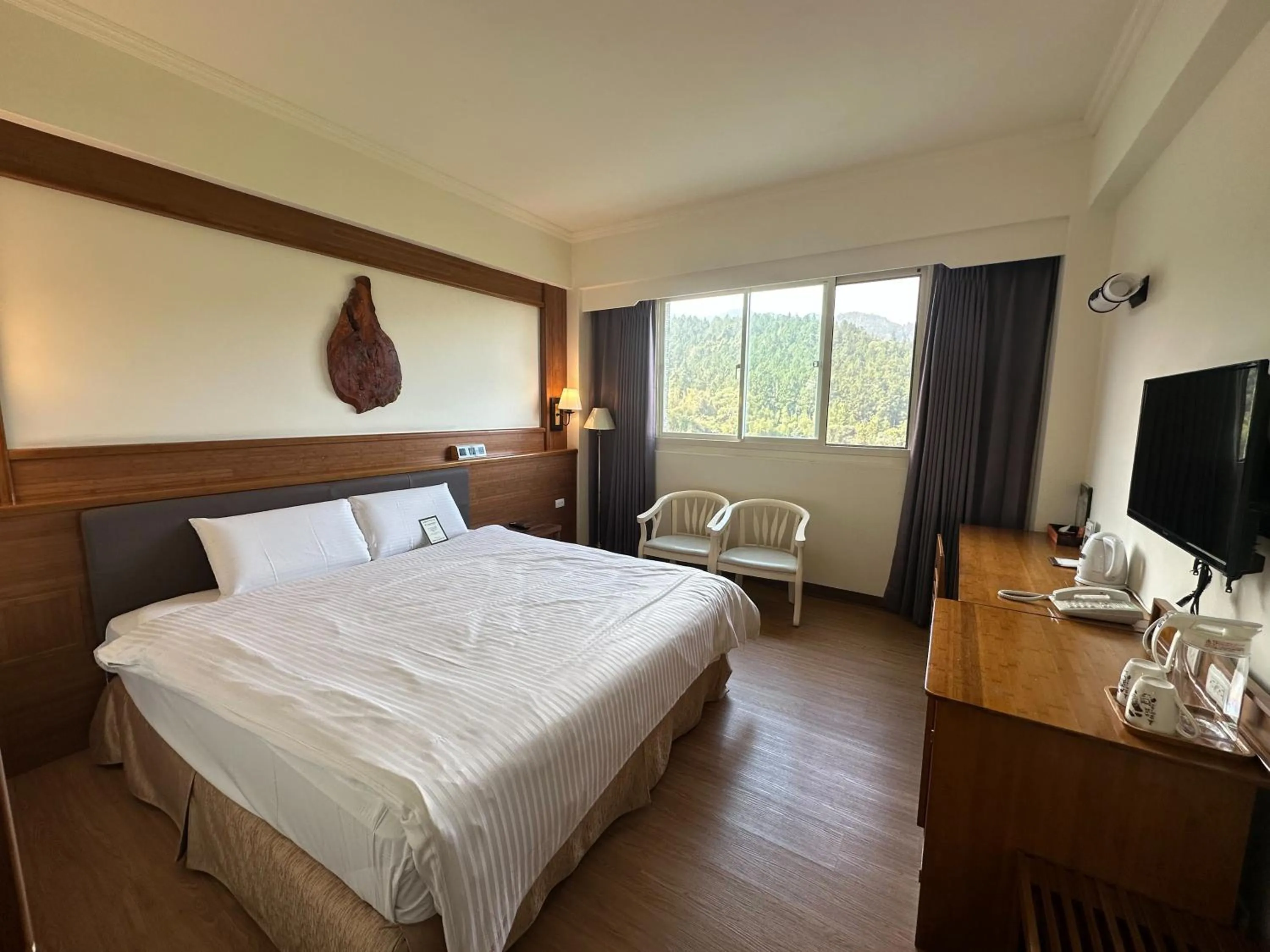 Photo of the whole room, Bed in Ginkgo Hotel