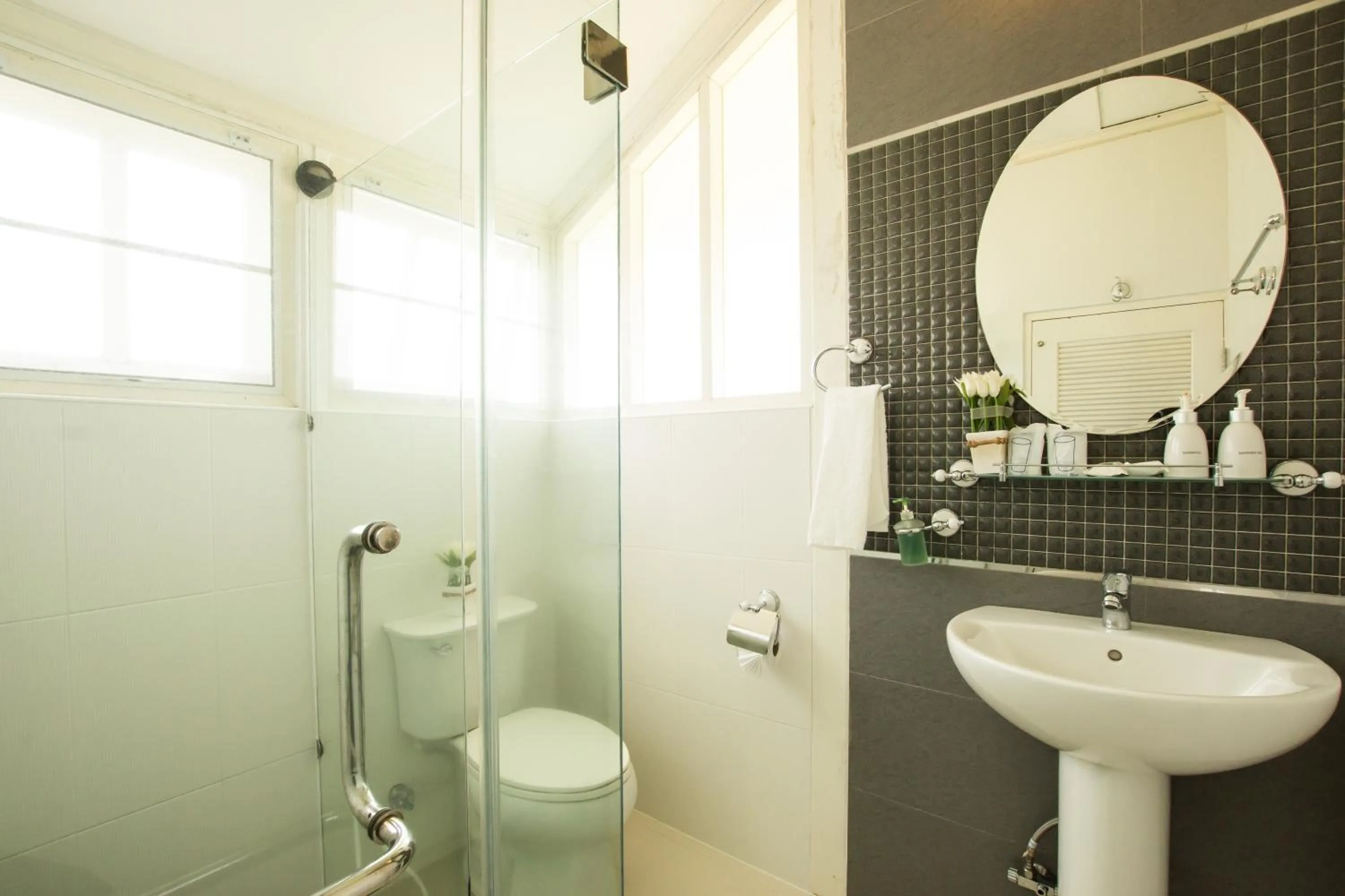 Shower in The Natural Garden Resort