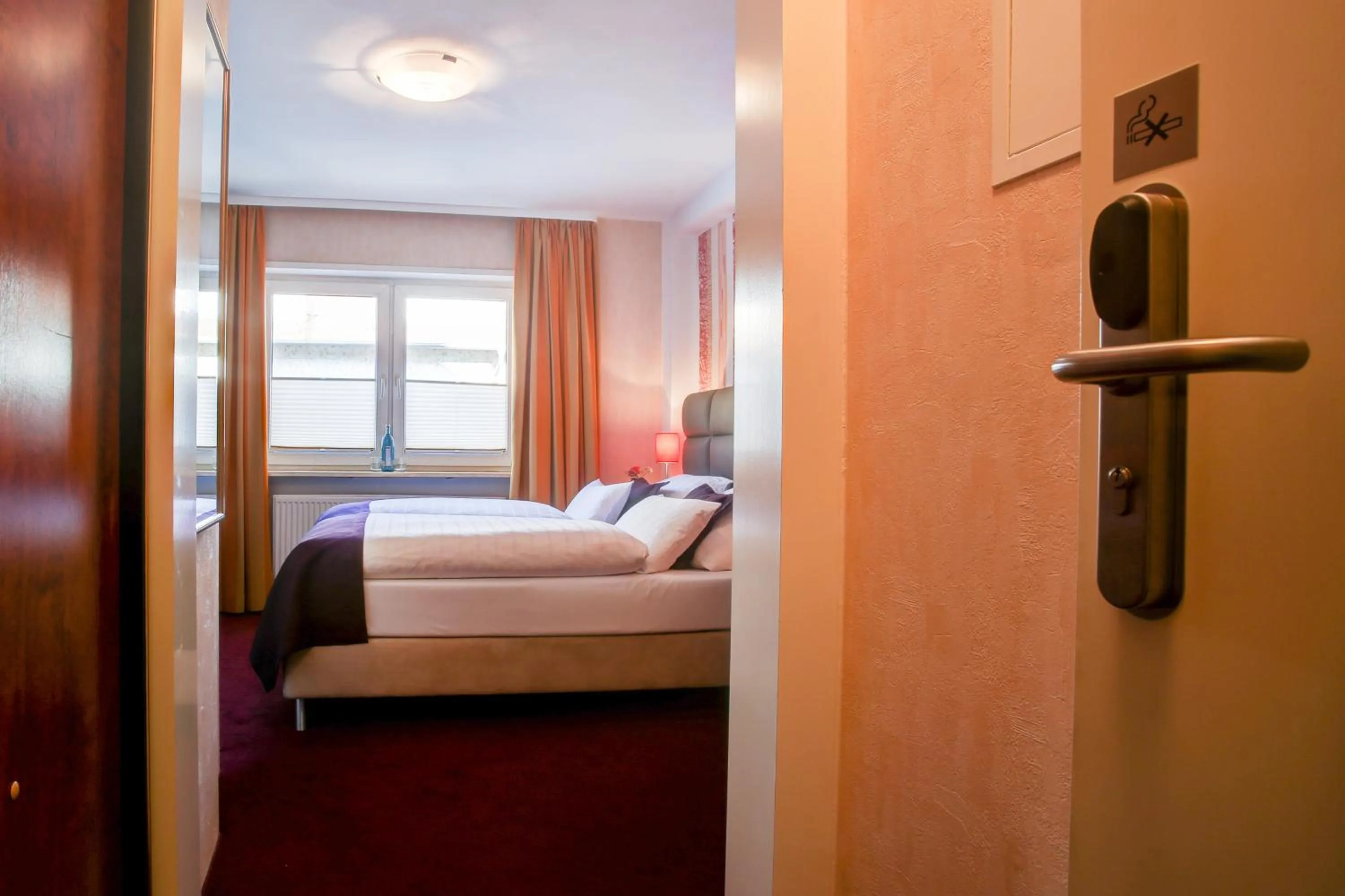 Bed in Rhein Neckar Hotel