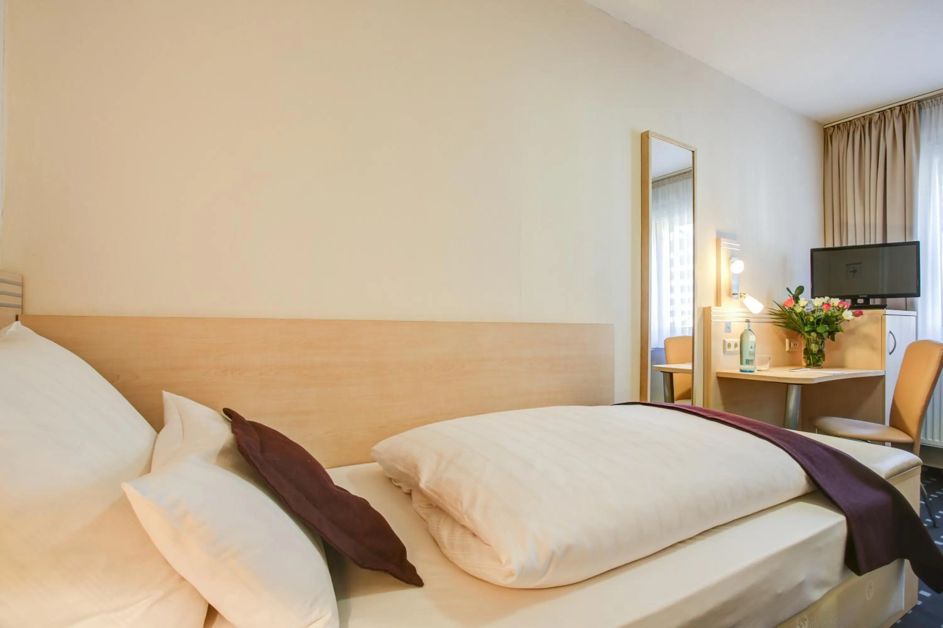 Bed in Rhein Neckar Hotel