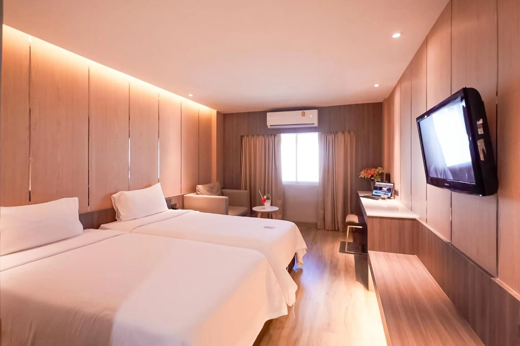 Bed in Golden City Rayong Hotel