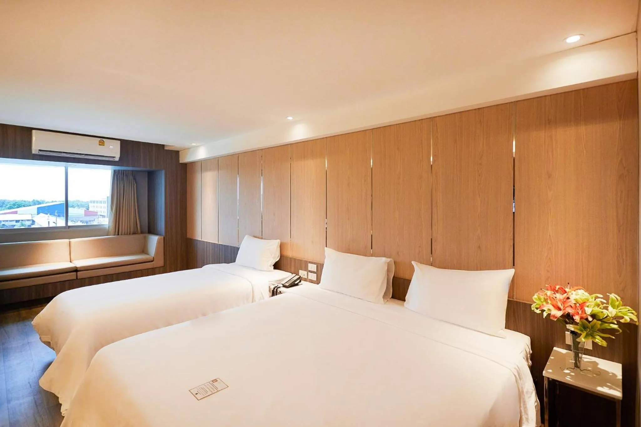 Bed in Golden City Rayong Hotel