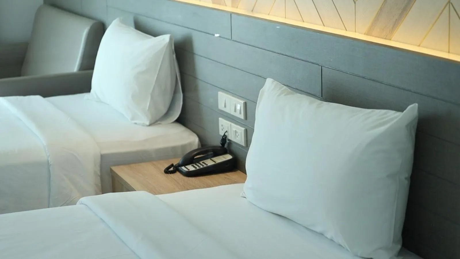 Bed in Golden City Rayong Hotel