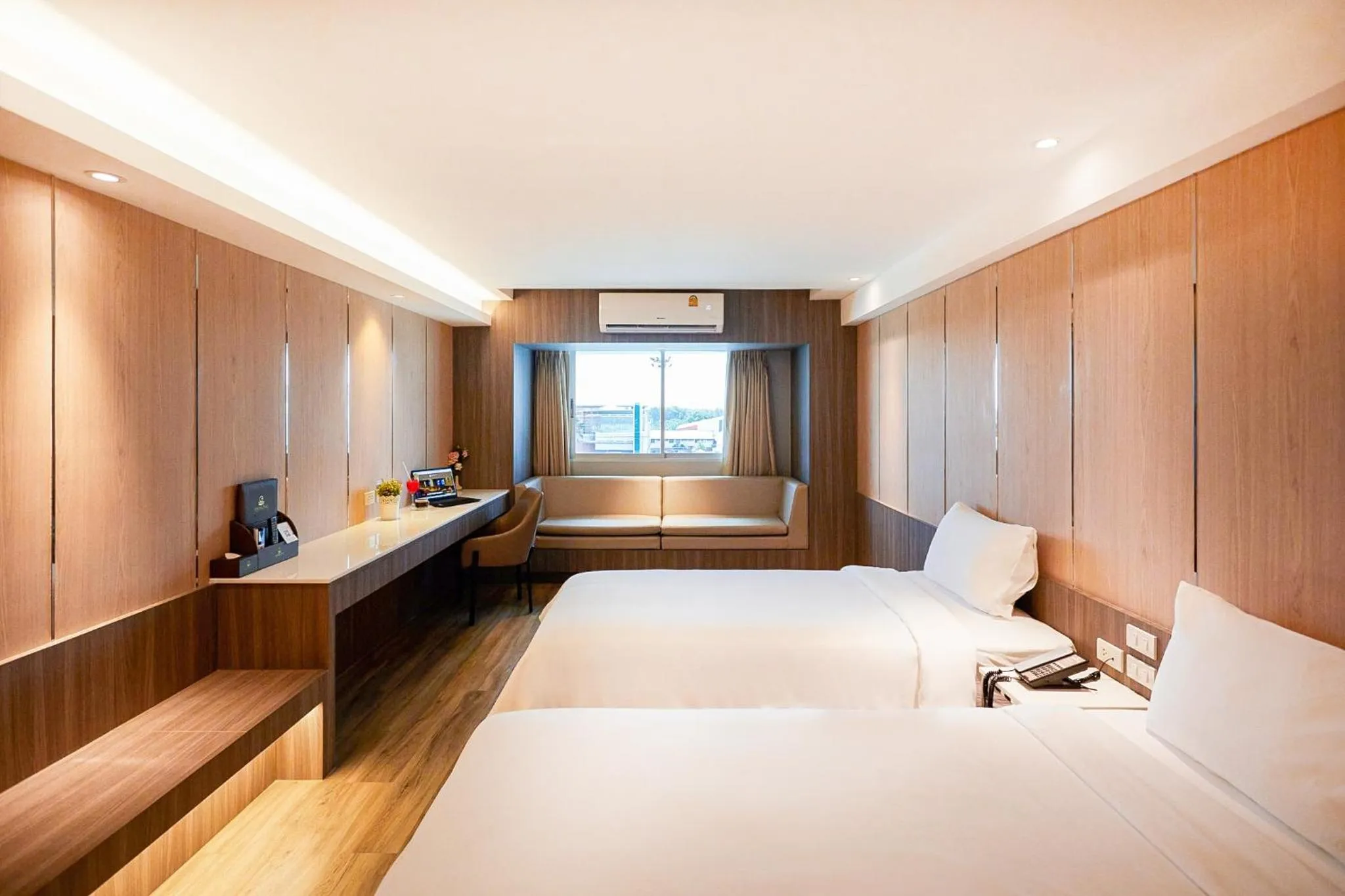 Bed in Golden City Rayong Hotel