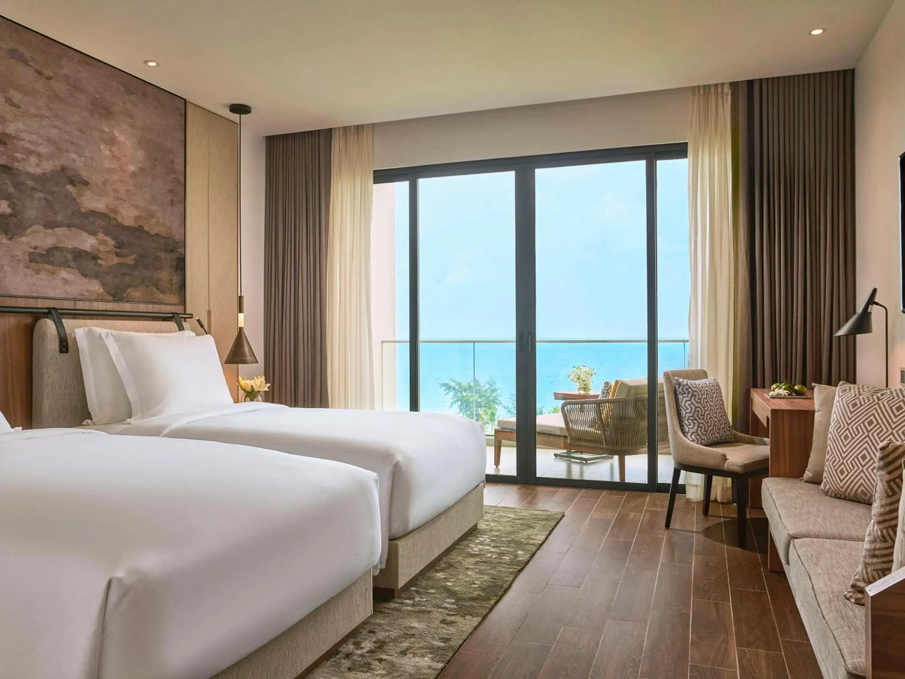 Superior Twin Room with Balcony and Sea View in Mövenpick Resort Waverly Phu Quoc Superior Twin Room with Balcony and Sea View in Mövenpick Resort Waverly Phu Quoc