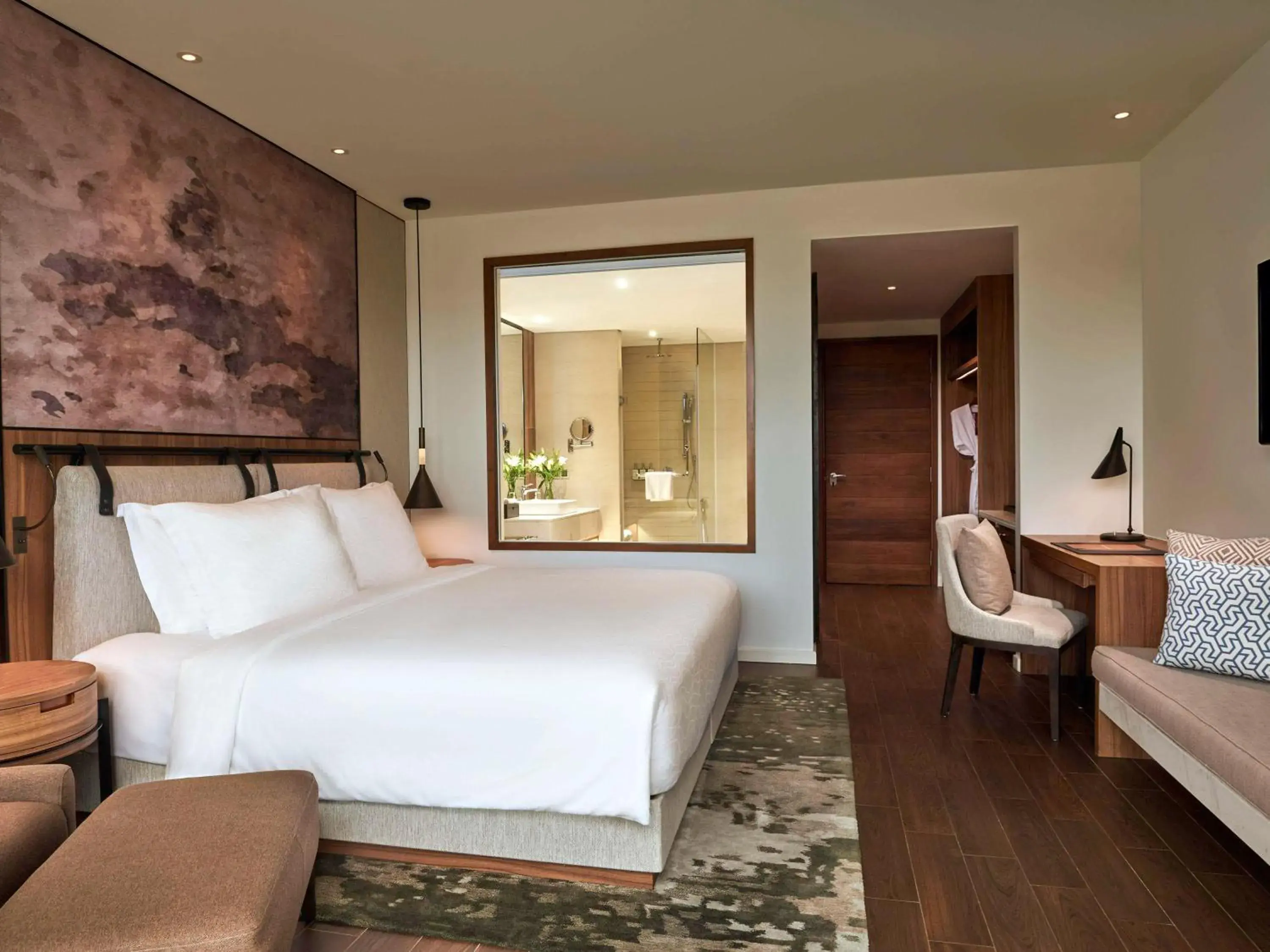 Superior King Room with Balcony and Garden View in Mövenpick Resort Waverly Phu Quoc Superior King Room with Balcony and Garden View in Mövenpick Resort Waverly Phu Quoc