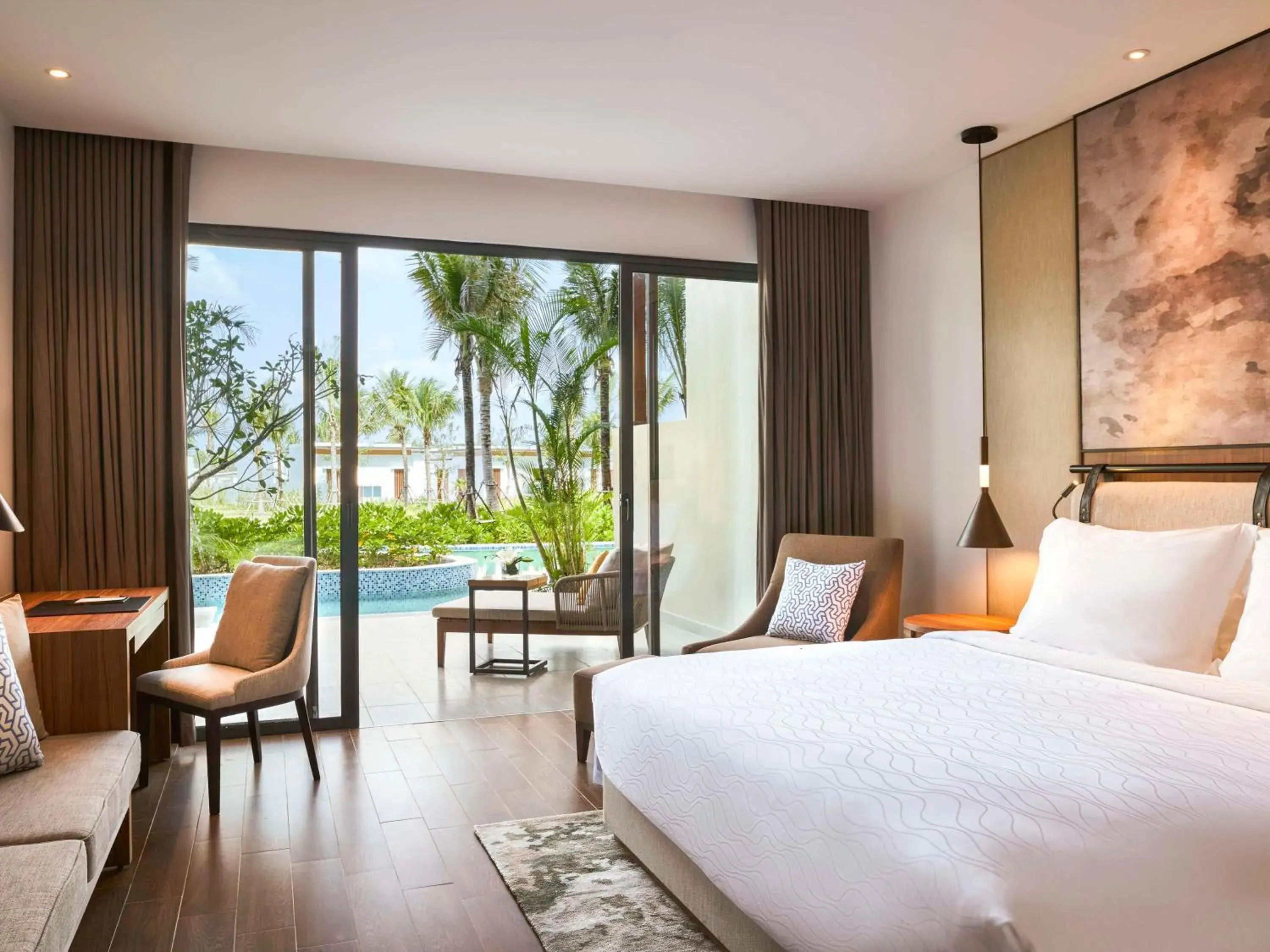 Superior King Room with Direct Pool Access in Mövenpick Resort Waverly Phu Quoc Superior King Room with Direct Pool Access in Mövenpick Resort Waverly Phu Quoc