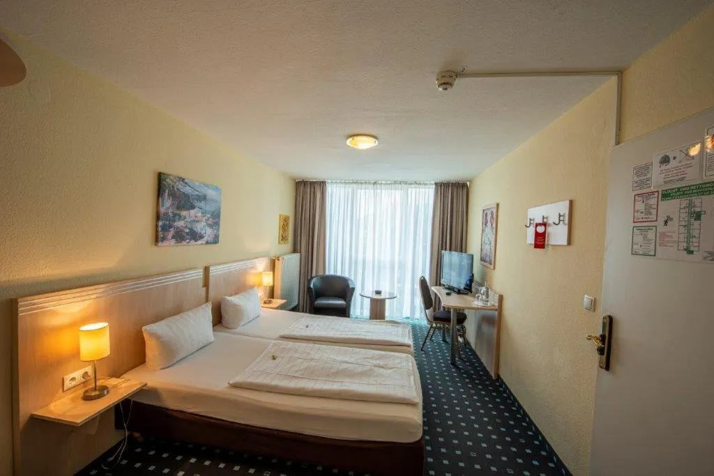 Bed in PANORAMA HOTEL in Neustadt an der Weinstraße