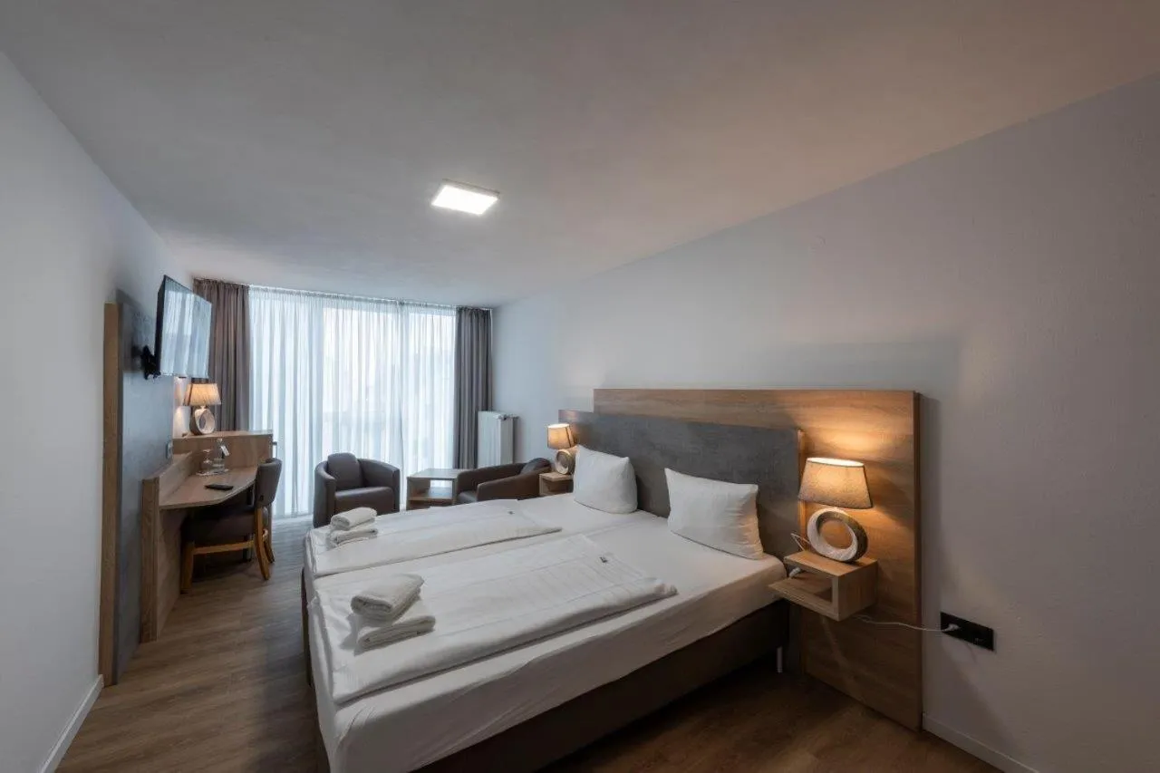 Bed in PANORAMA HOTEL in Neustadt an der Weinstraße