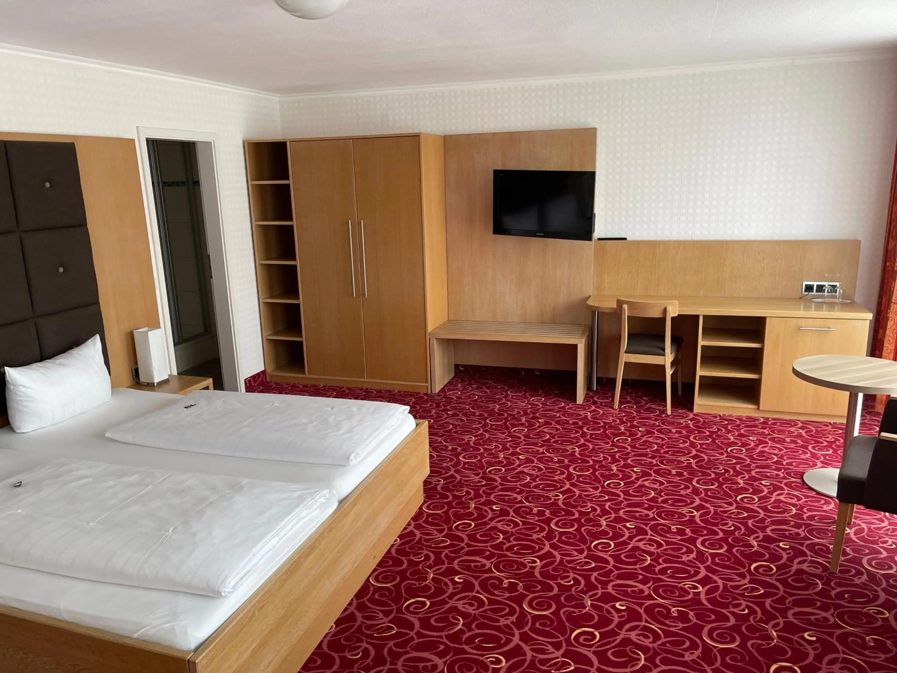 Bed in PANORAMA HOTEL in Neustadt an der Weinstraße