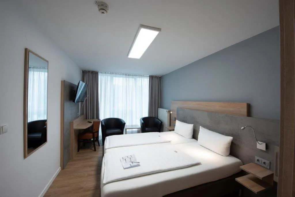 Bed in PANORAMA HOTEL in Neustadt an der Weinstraße