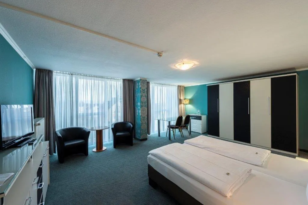 Bed in PANORAMA HOTEL in Neustadt an der Weinstraße