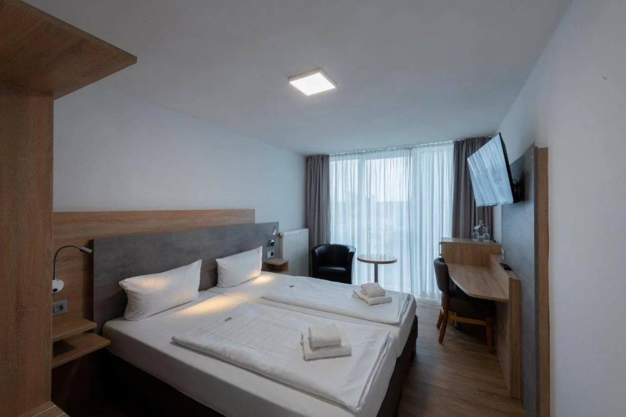 Bed in PANORAMA HOTEL in Neustadt an der Weinstraße