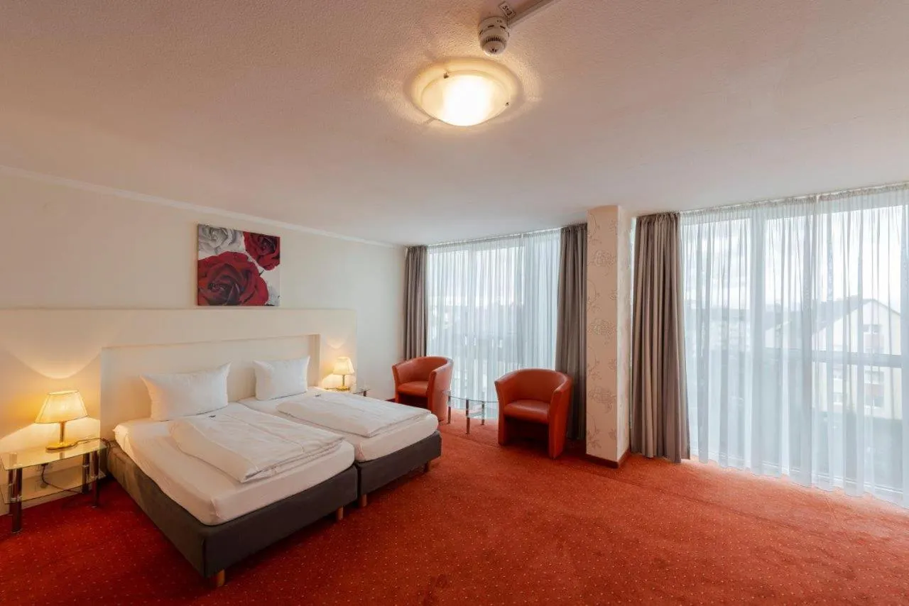 Bed in PANORAMA HOTEL in Neustadt an der Weinstraße