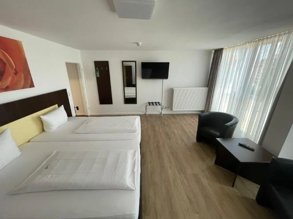 Bed in PANORAMA HOTEL in Neustadt an der Weinstraße