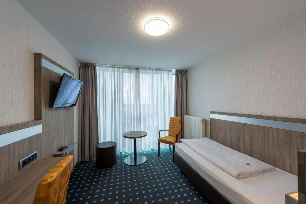 Photo of the whole room, Bed in PANORAMA HOTEL in Neustadt an der Weinstraße
