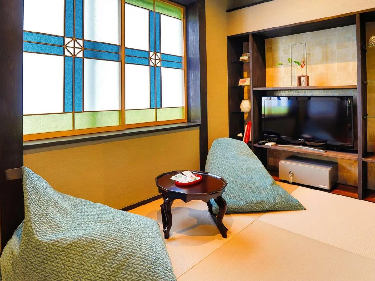 Living room, Bed in Kinosaki Tenboen
