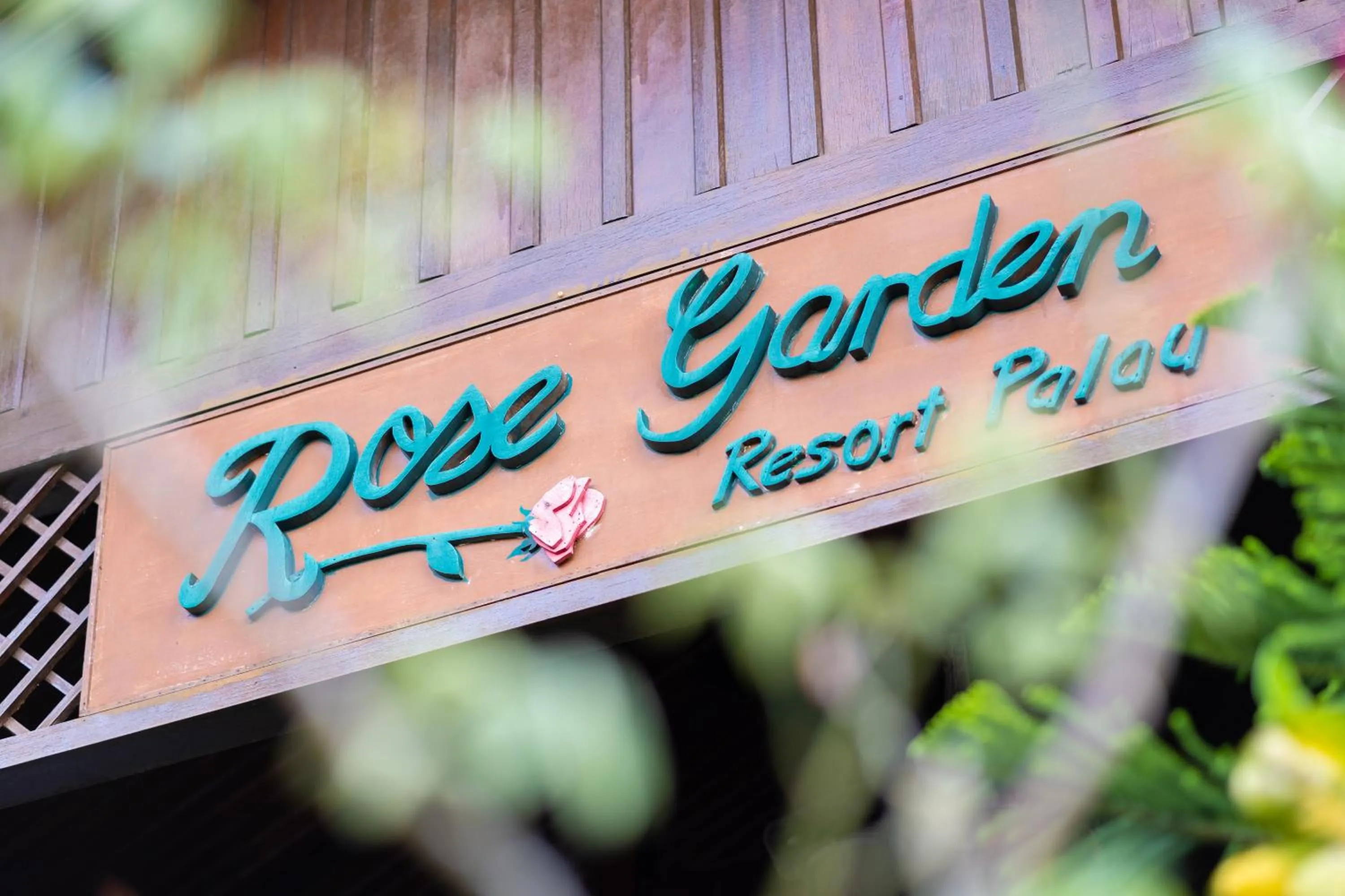Property logo or sign in Rose Garden Resort