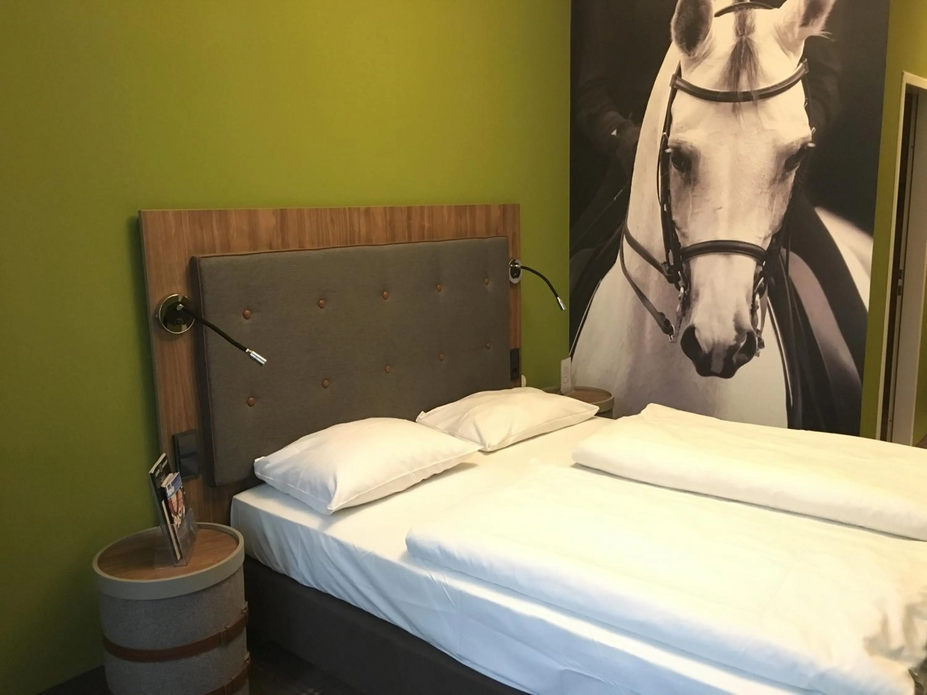 Bed in The Ascot Hotel