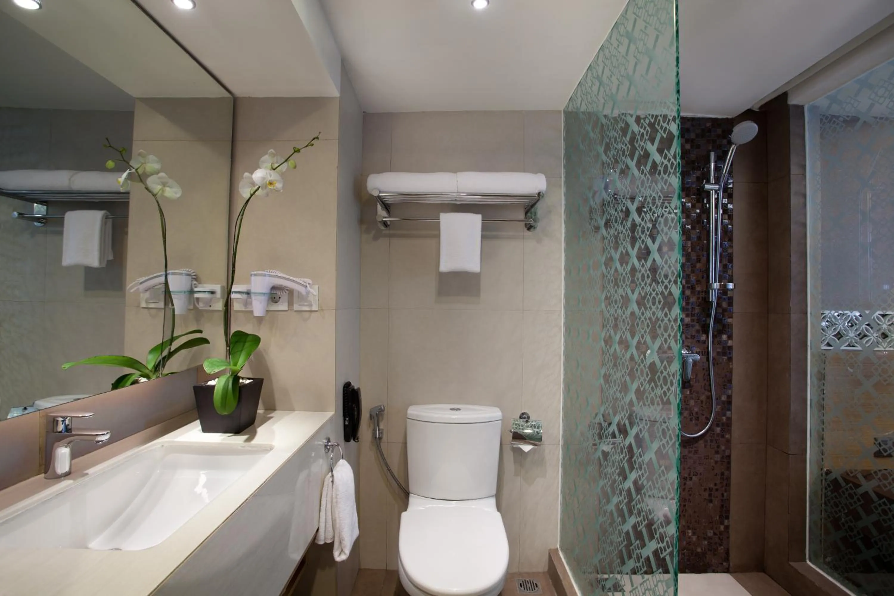 Bathroom in Ramada by Wyndham Bali Sunset Road Kuta