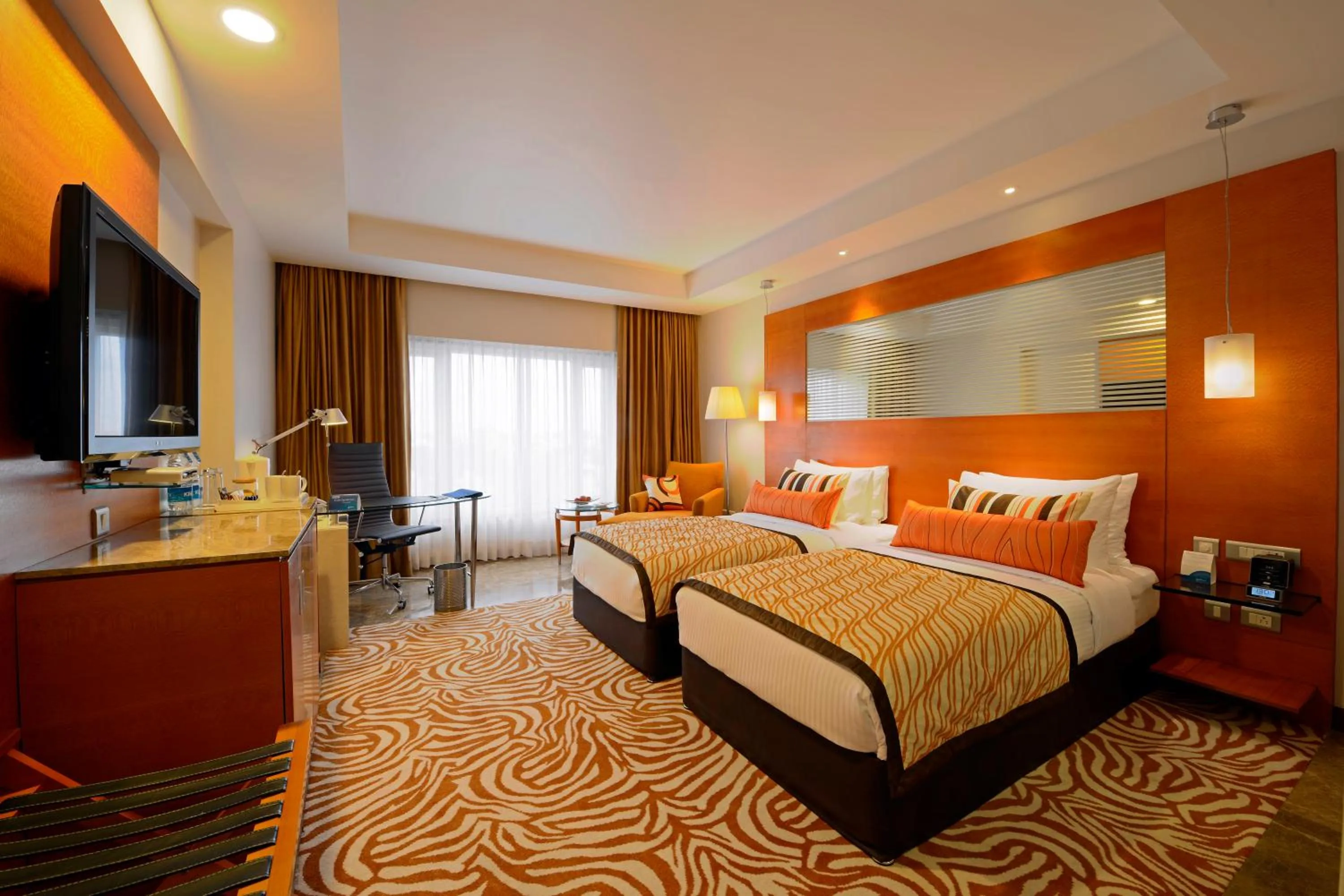 Photo of the whole room, Bed in Radisson Blu Hotel Ahmedabad