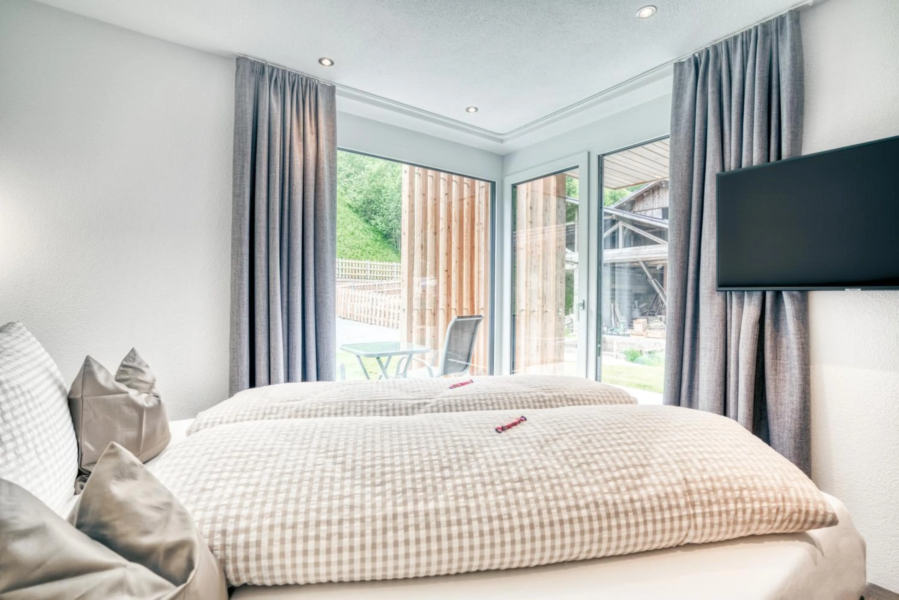 Communal lounge/ TV room, Bed in Apart Gstrein - including Silvretta Premium Summercard