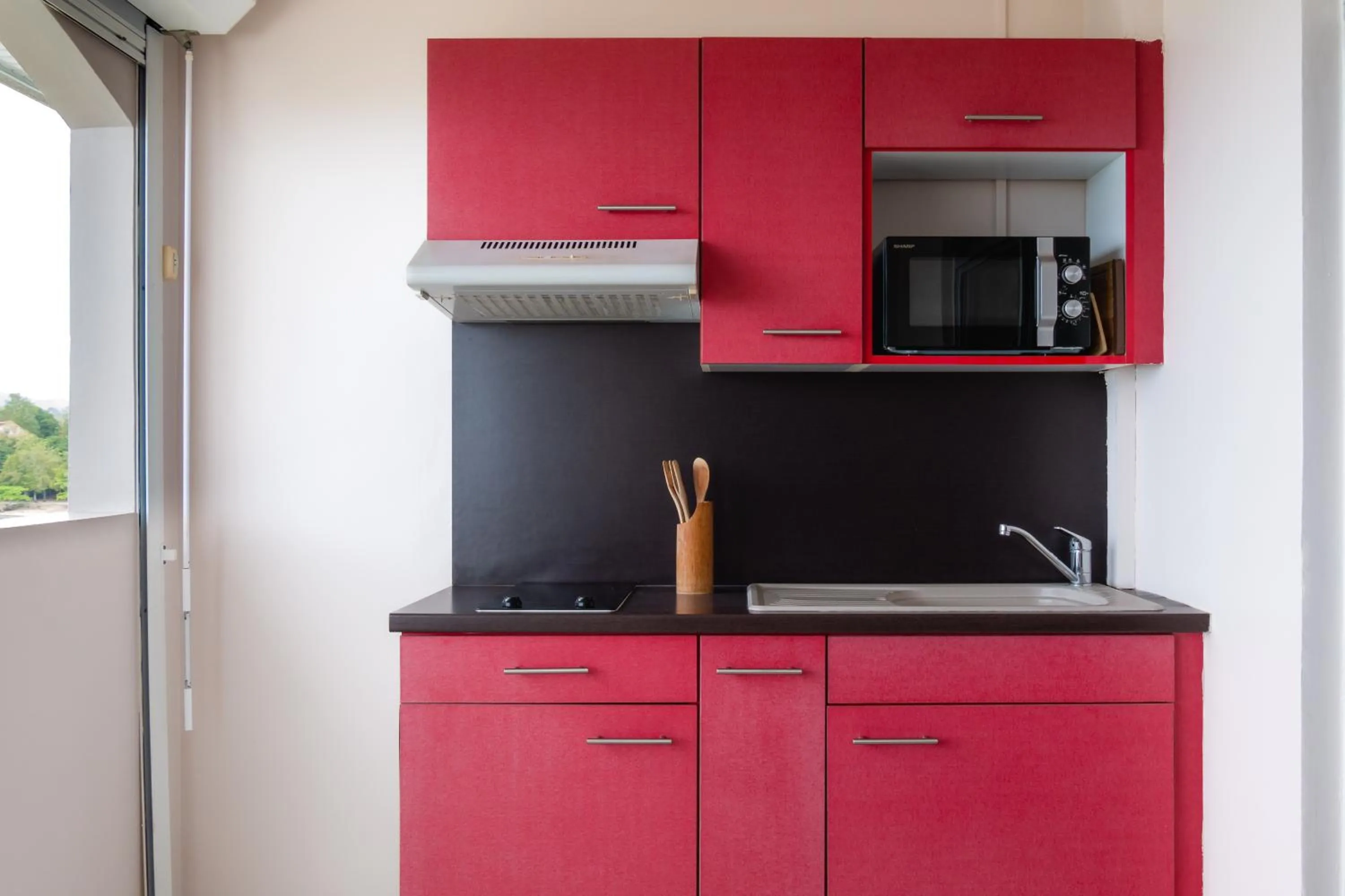 Kitchen or kitchenette in Hôtel Iloma