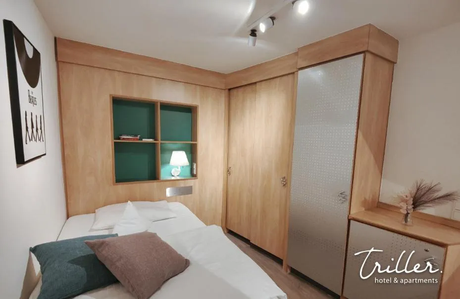 Bed in Hotel Am Triller - Hotel & Serviced Apartments